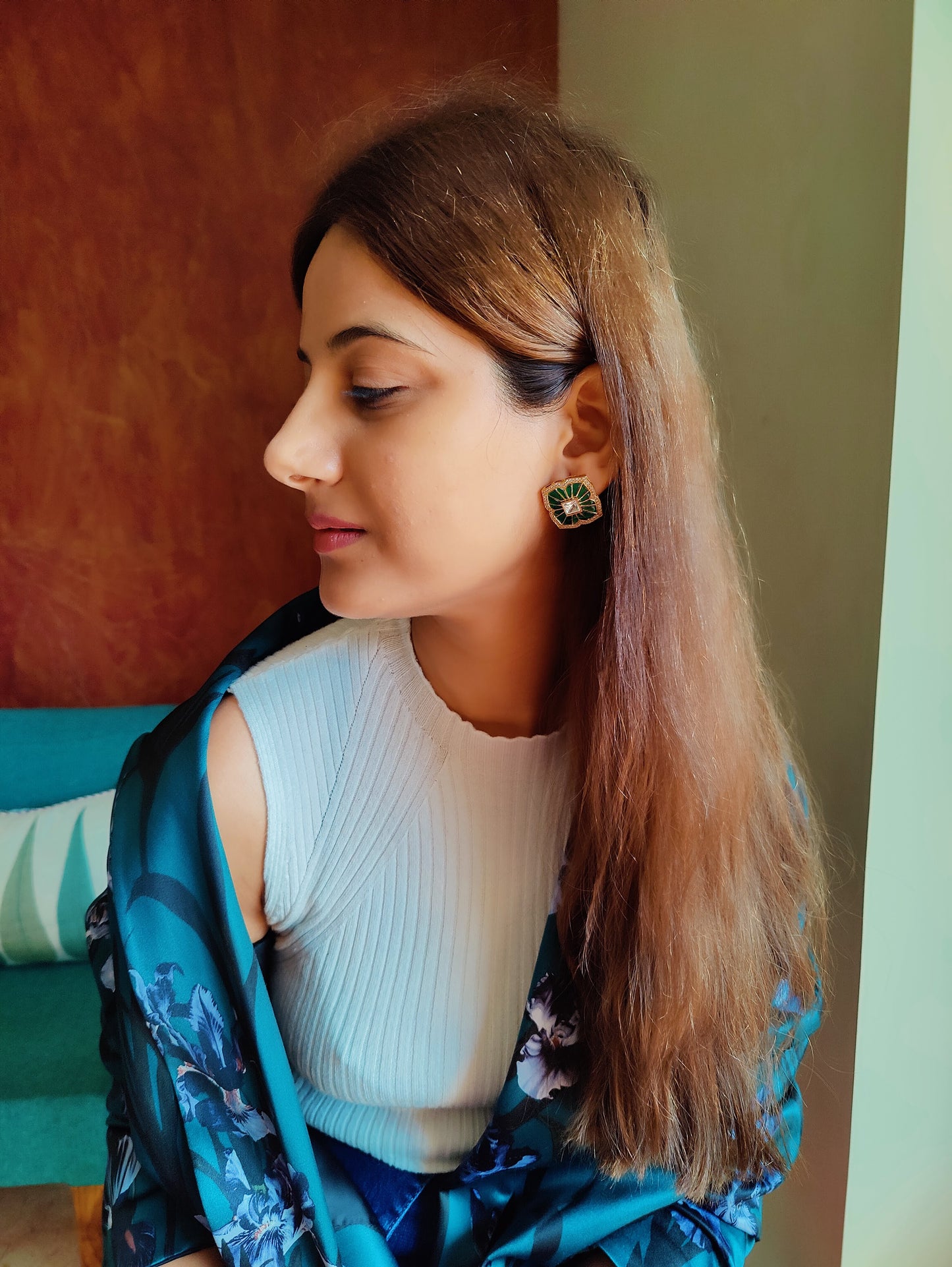 Green stone inlay studs (earrings) with golden spike work on stone