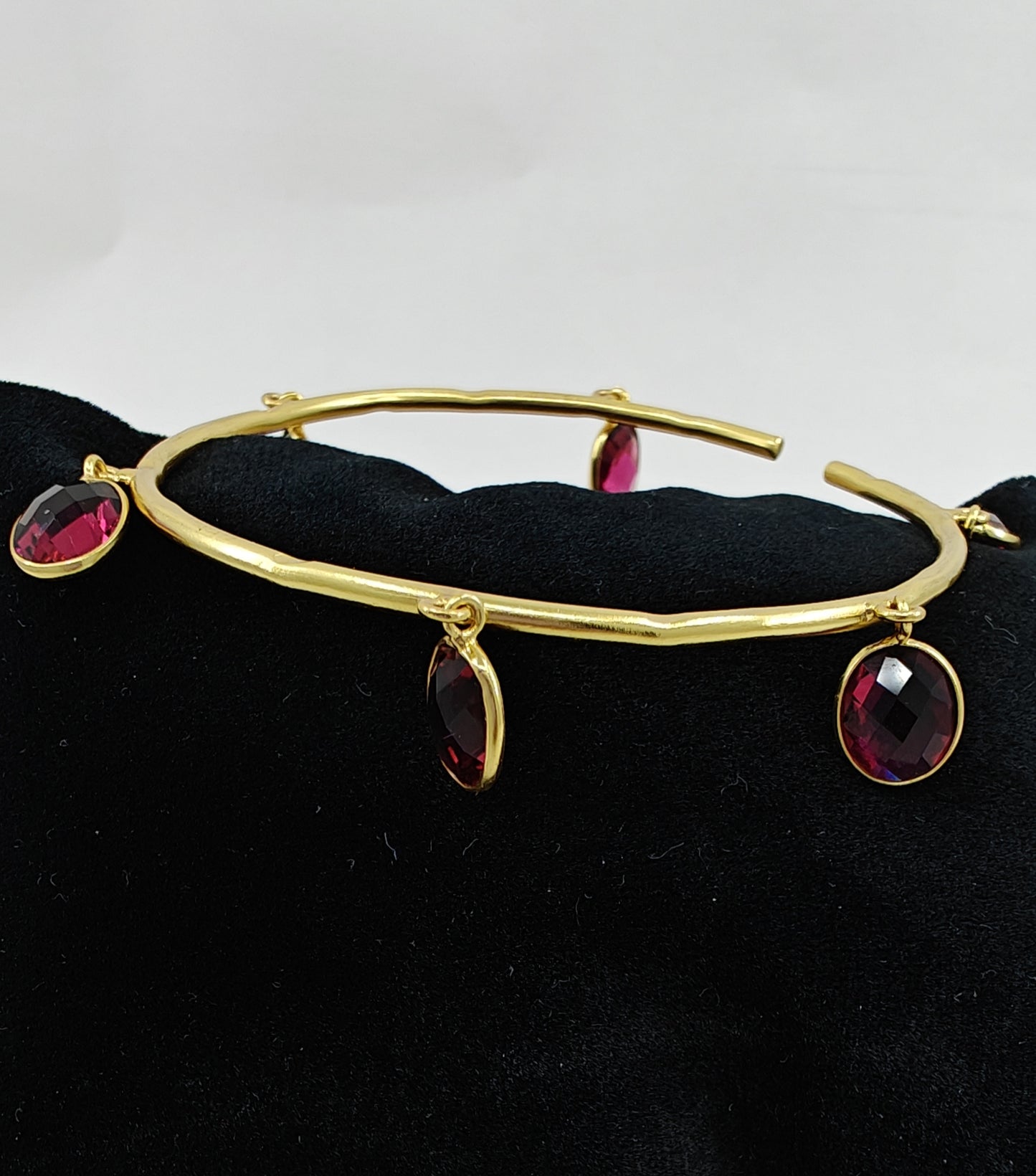 Bangle with stone hangings