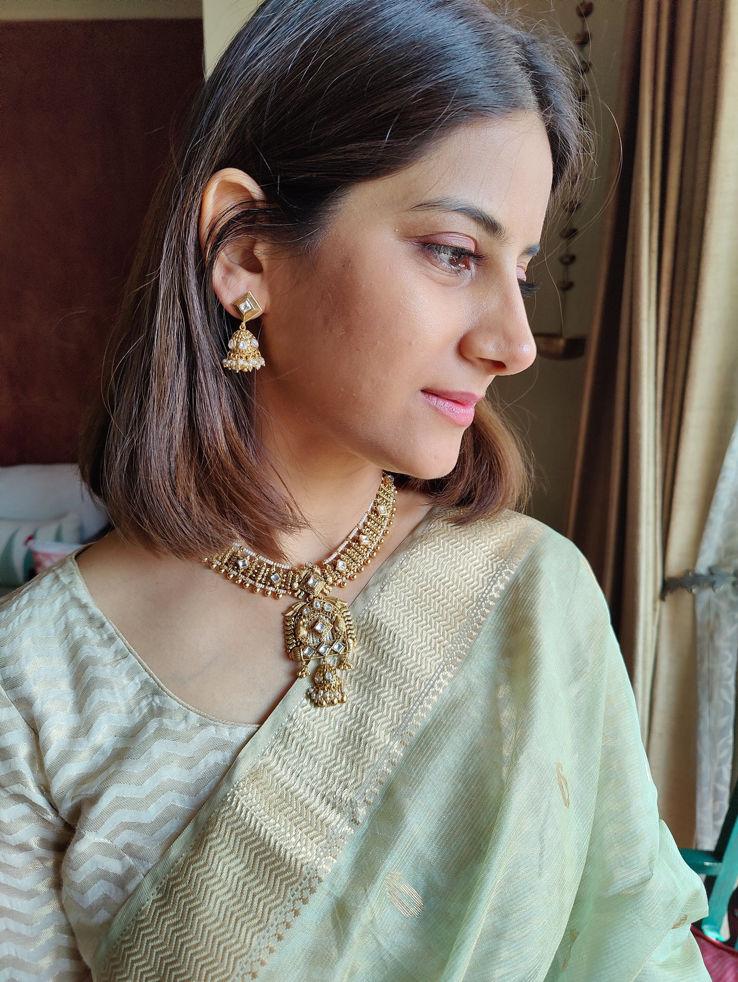 Delicate Ishrat set with kundan and pearls