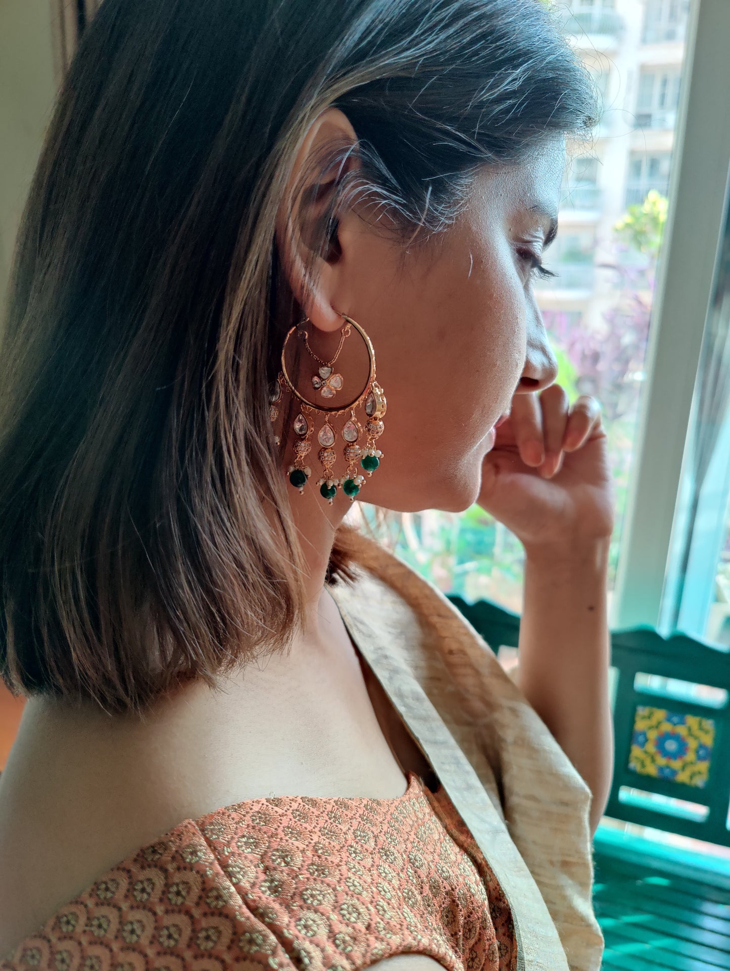 Bali's(earrings) in emerald green stone and kundan
