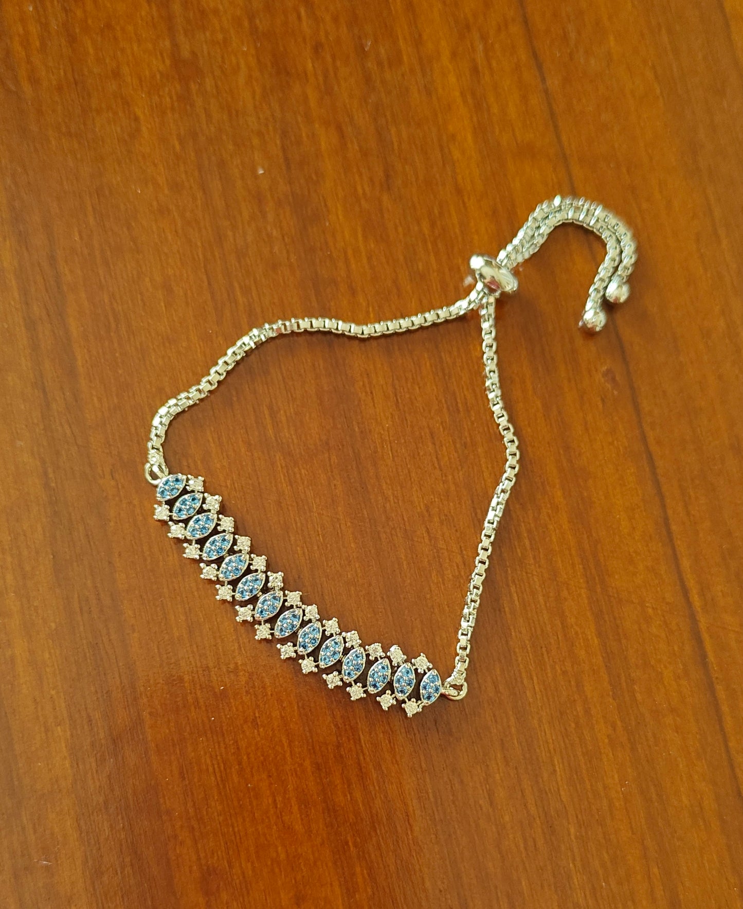 Push button bracelet with nano stones