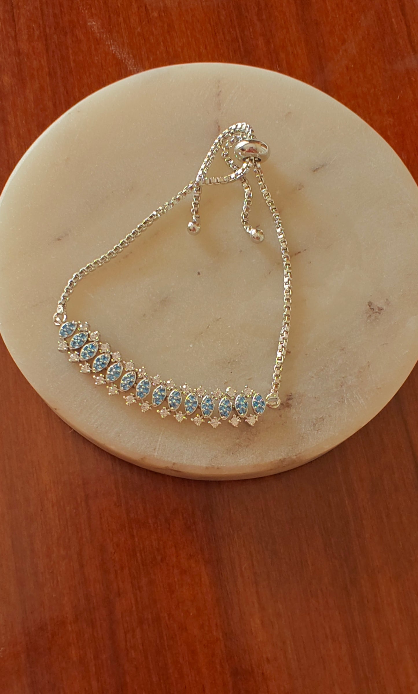 Push button bracelet with nano stones