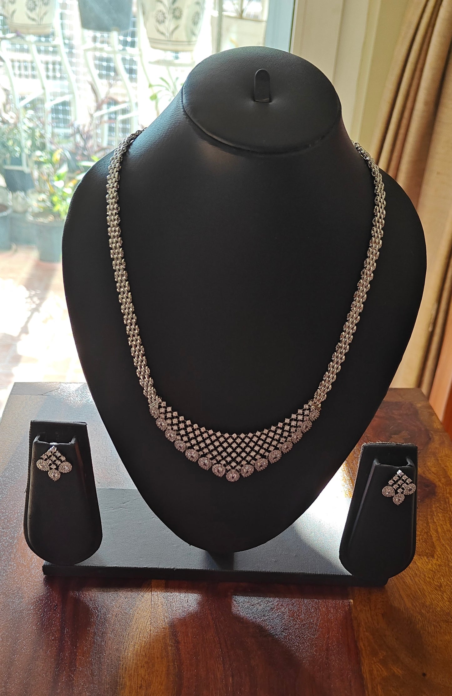 Ela set with cz in rhodium finish
