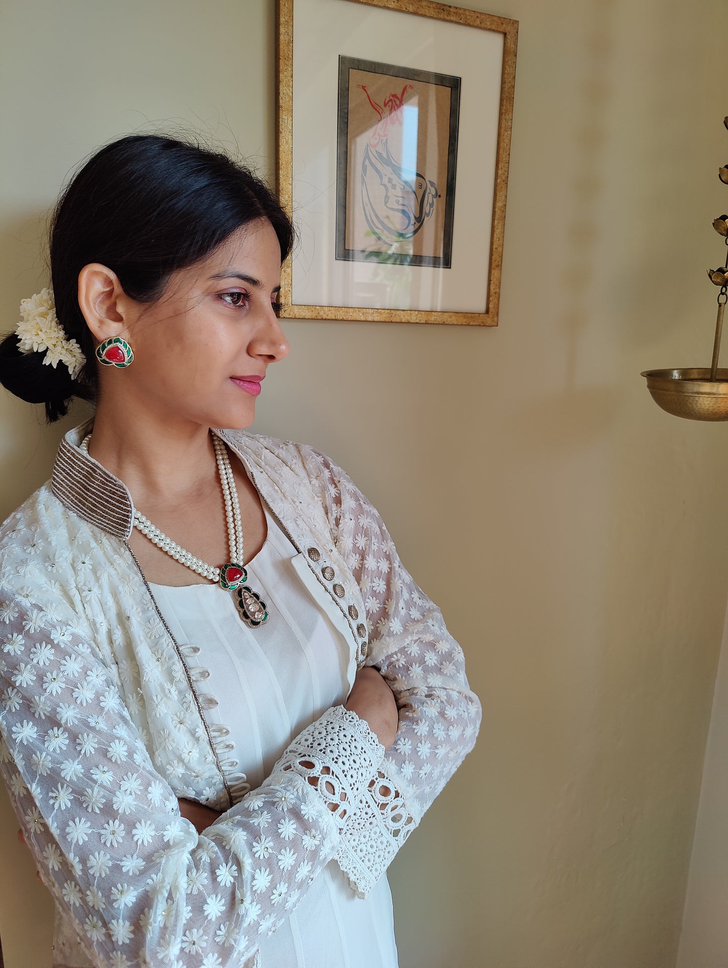Bhanuja pearl strings set with kundan and stone