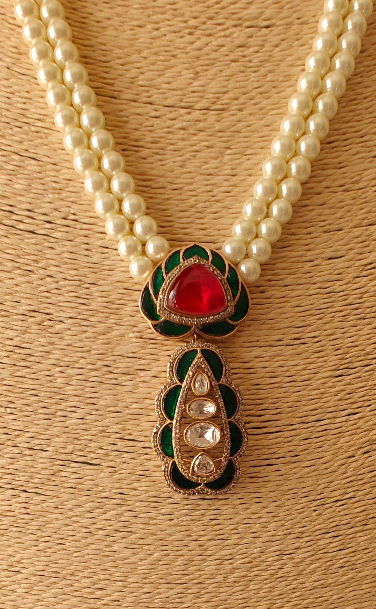 Bhanuja pearl strings set with kundan and stone