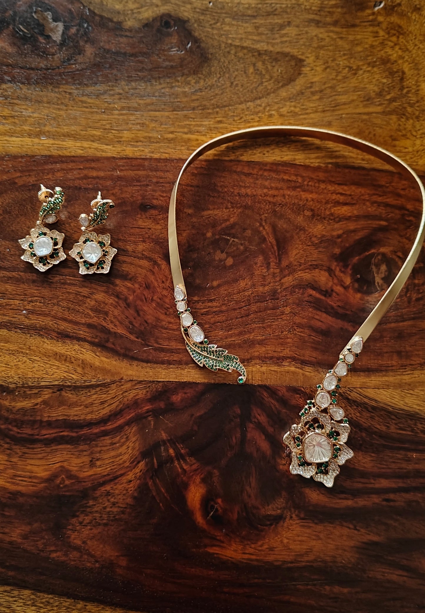 Hemlata gold hasli with kundan and coloured stones