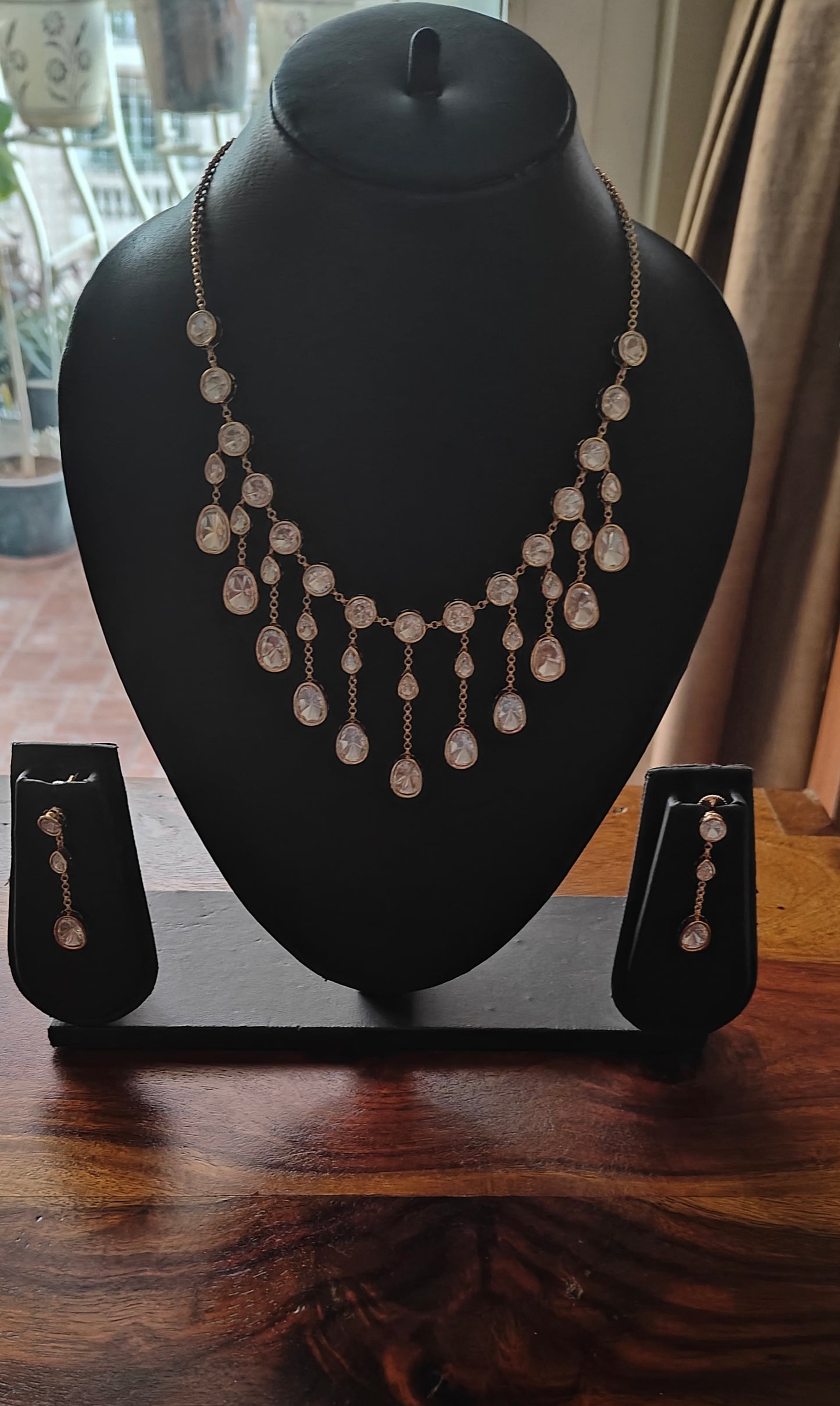 Darika set with suspended mossanite pieces
