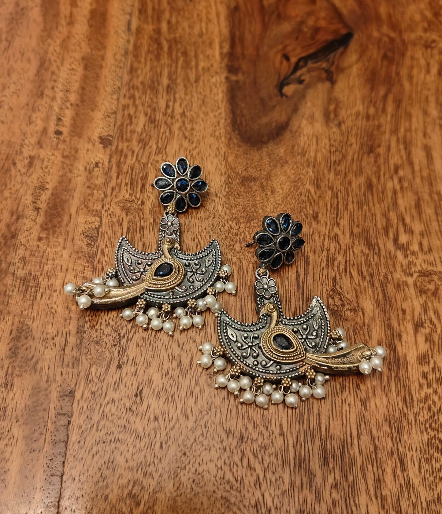 Dual tone peacock earrings with stones and pearls