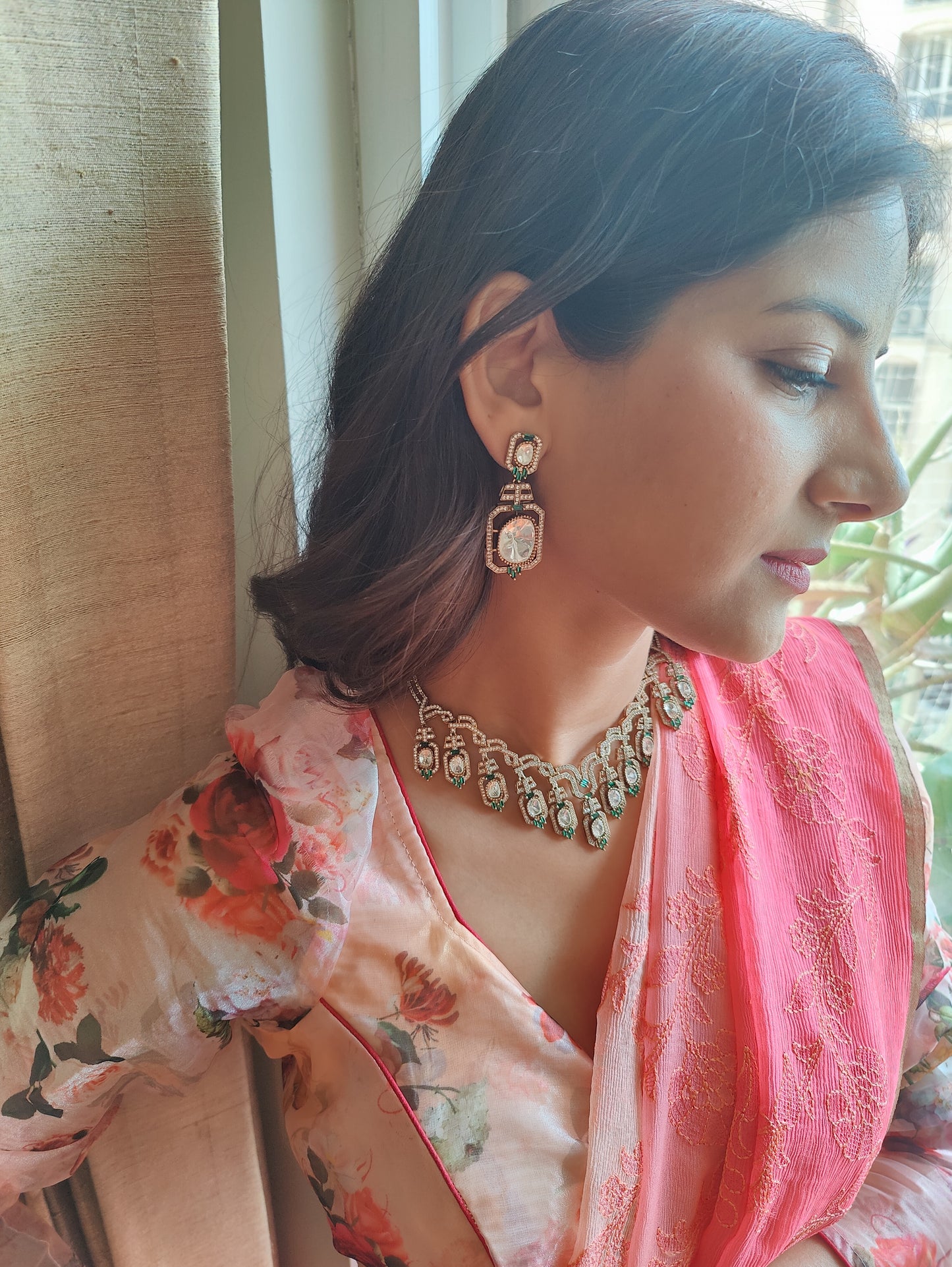 Geena set with moissanite and emerald green stone
