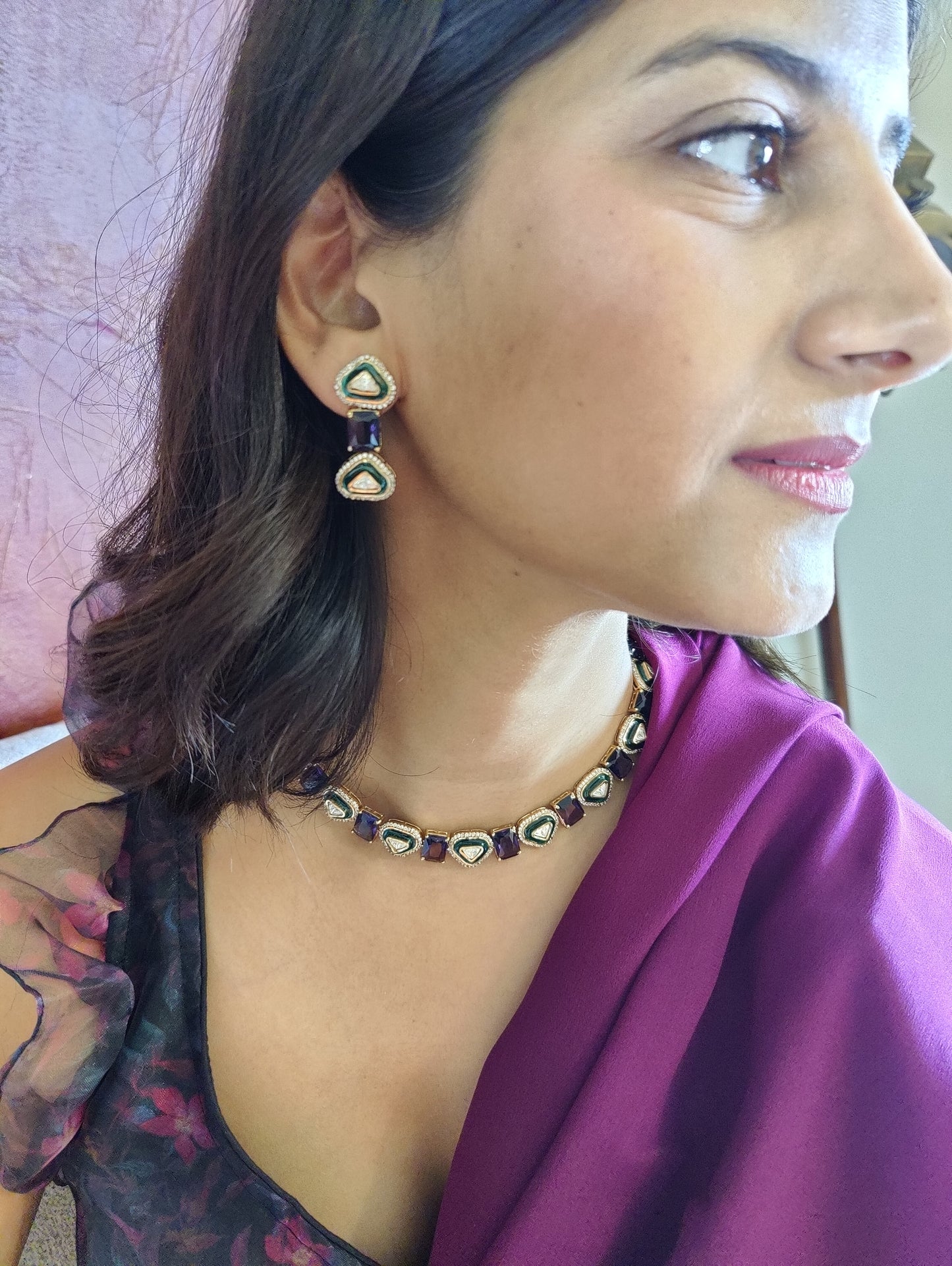 Eka set with stones alternating with triangular kundan pieces with meenakari