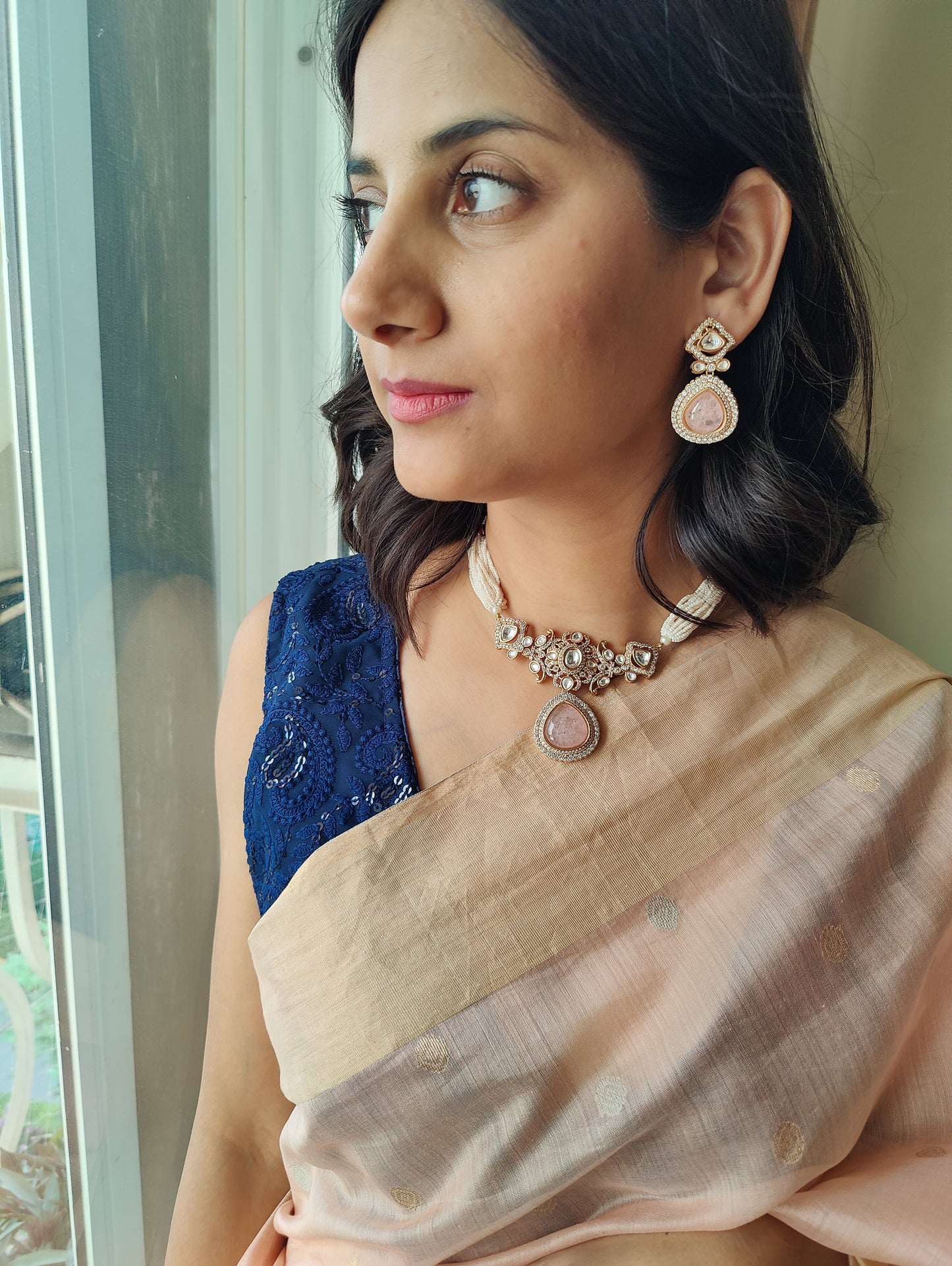 Nirupa choker set with stone and moissanite on poth pearl strings