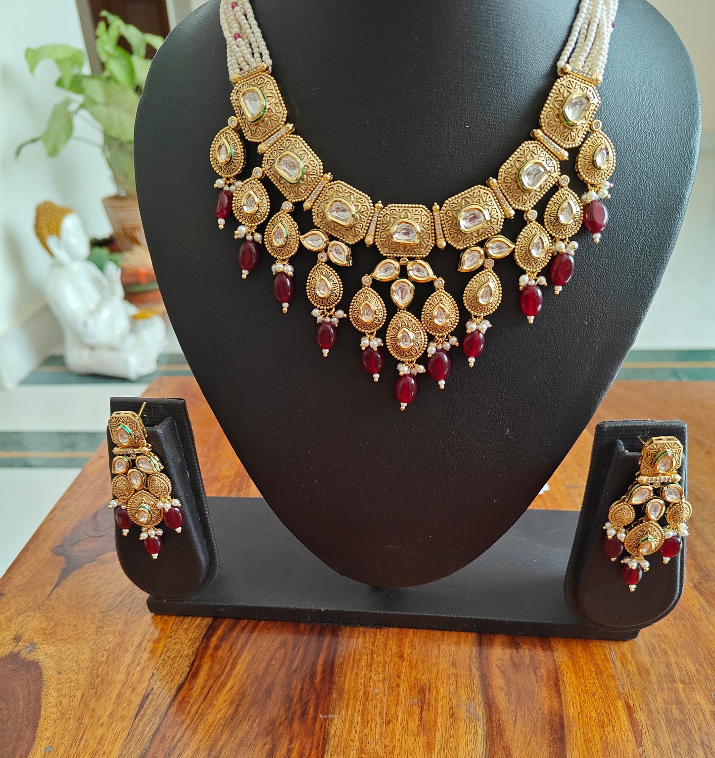 Mohana set in antique gold and kundan