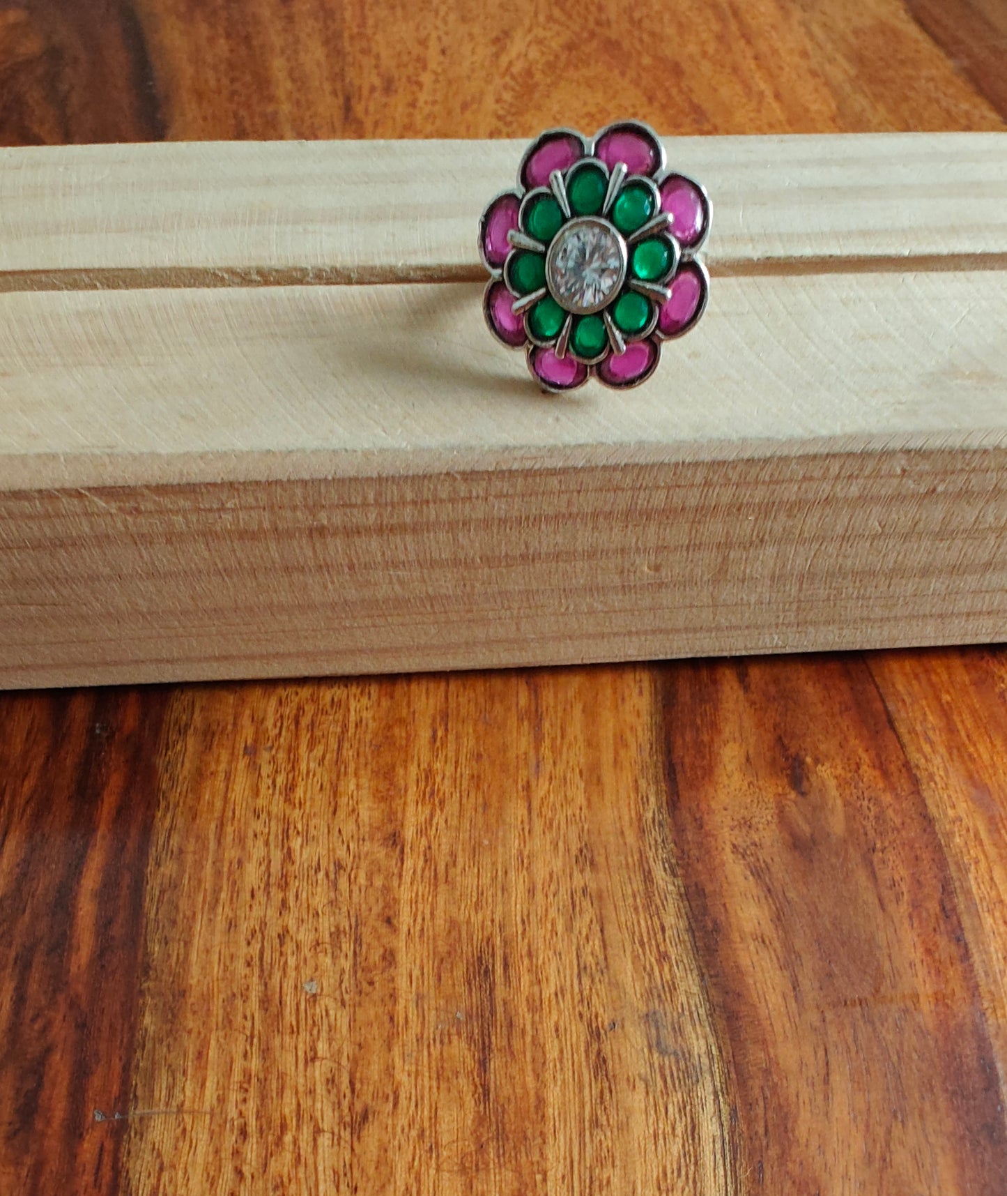 Sterling silver ring with red and green stone