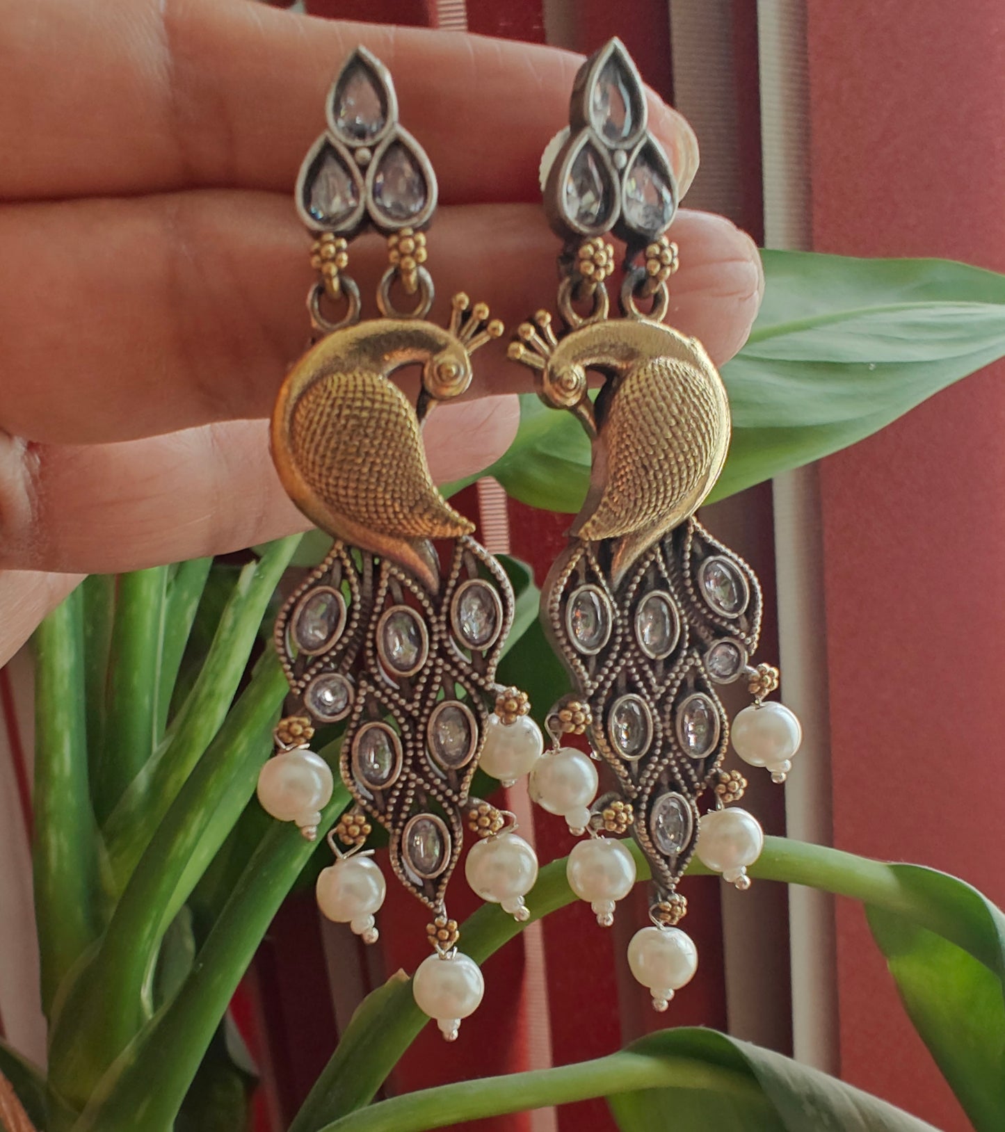 Dual tone peacock earrings with stone