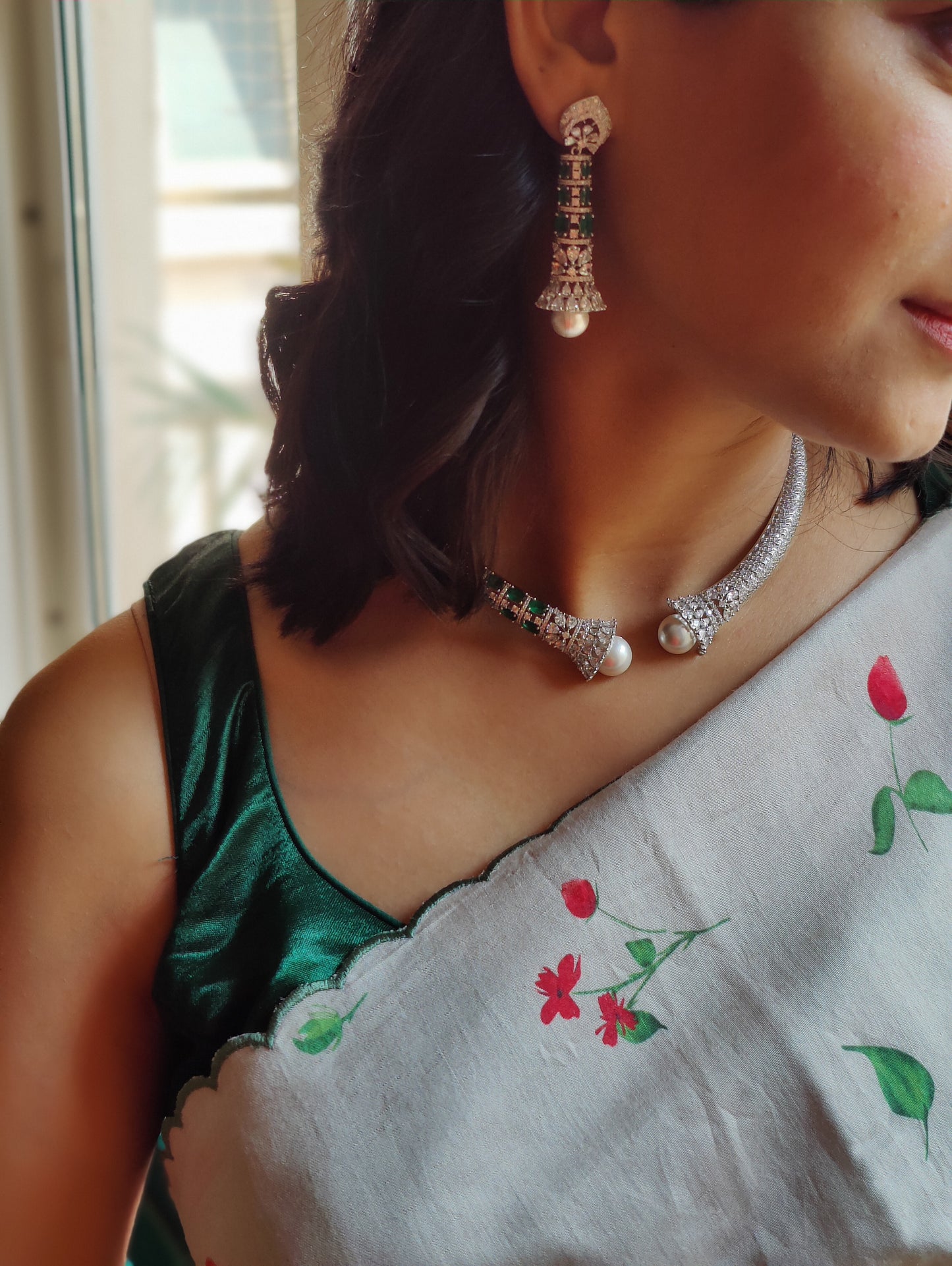 Joel choker with emerald green stone and pearl