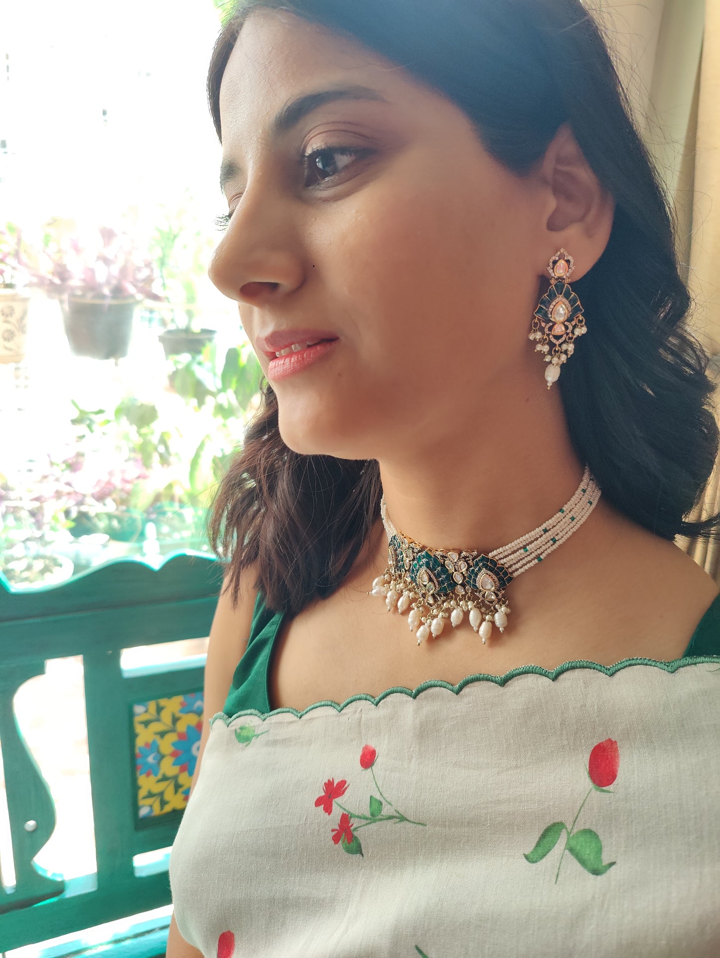 Jagavi choker set with green kemp stones on poth pearl strings