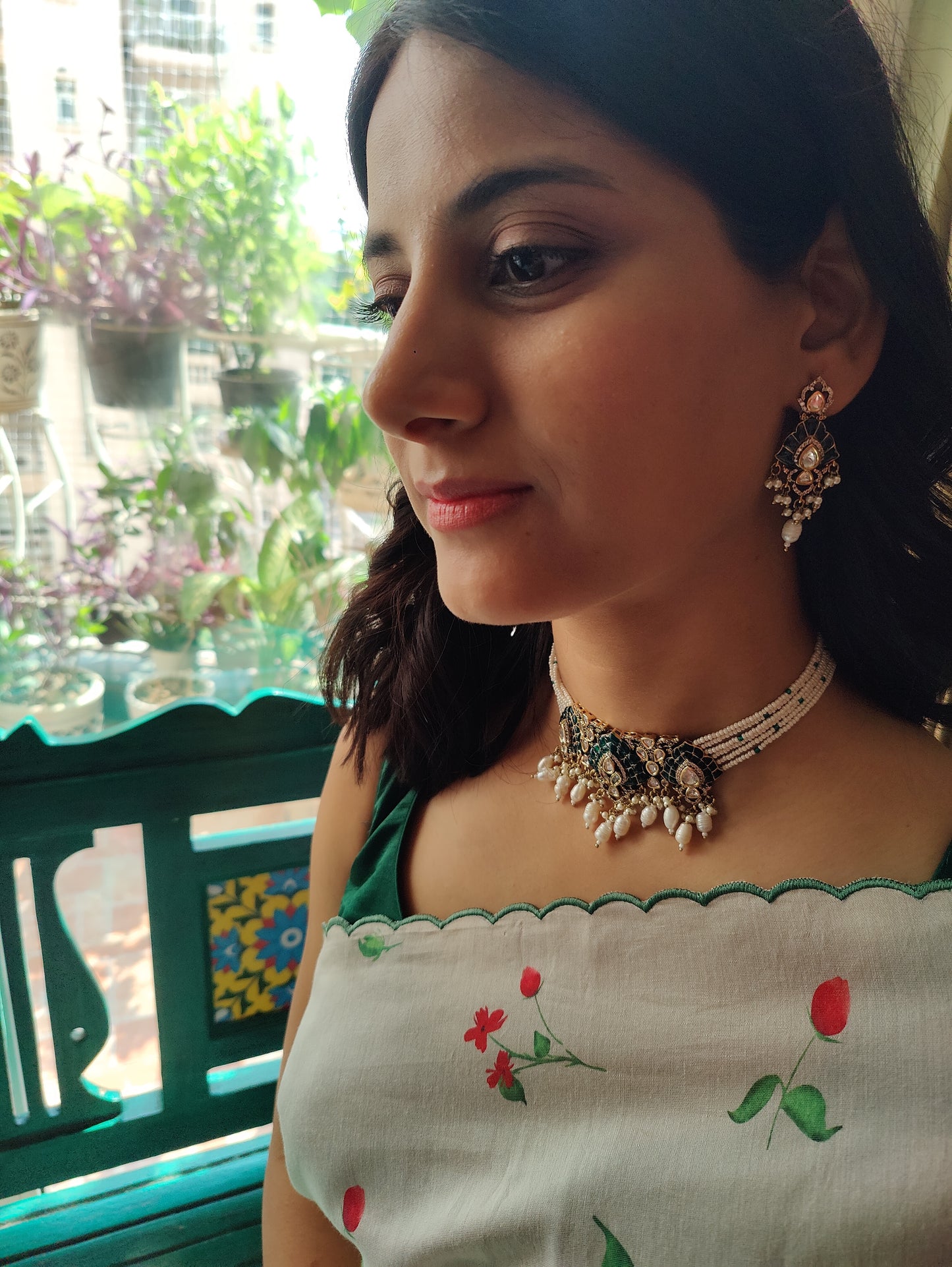 Jagavi choker set with green kemp stones on poth pearl strings