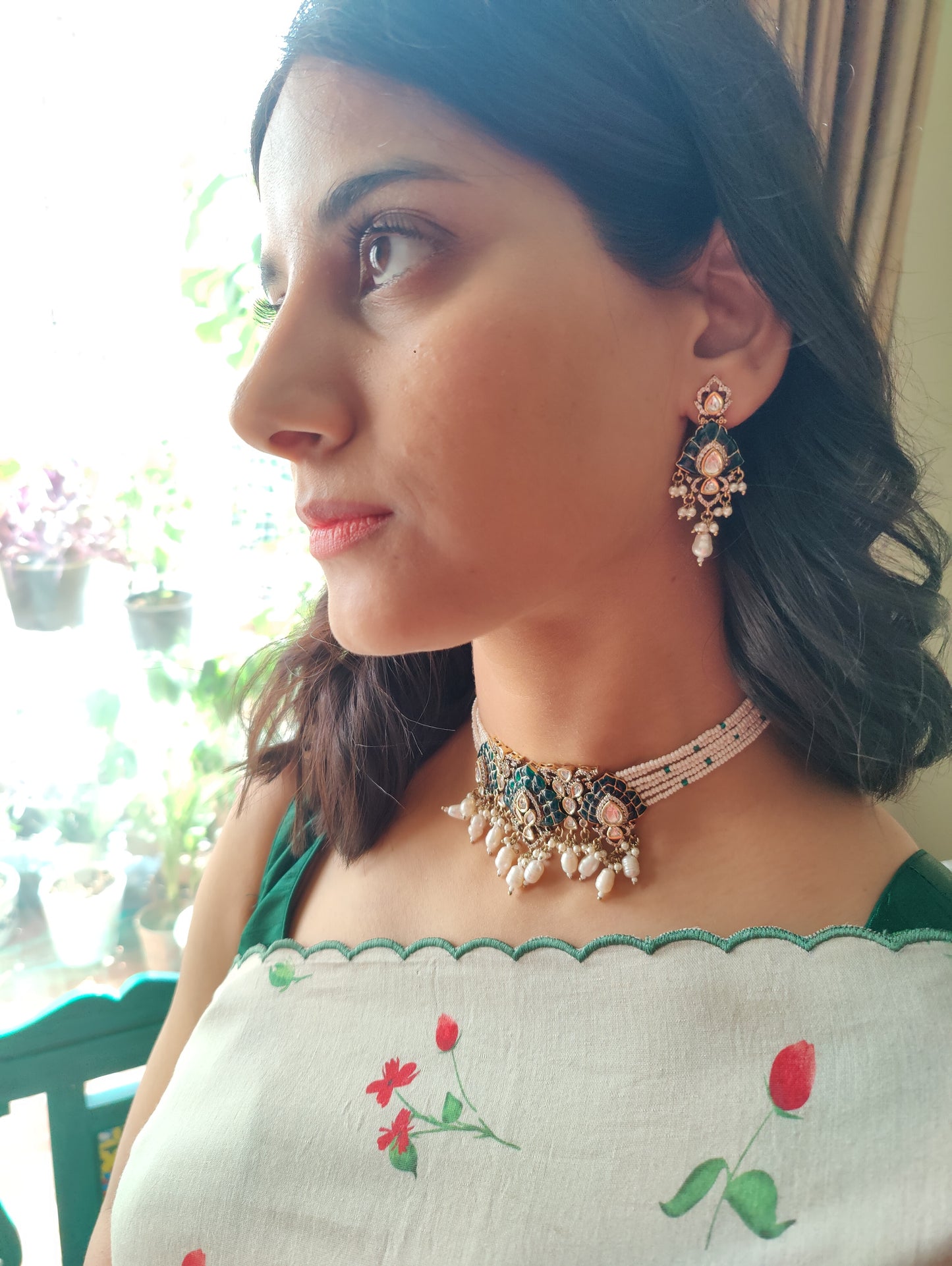Jagavi choker set with green kemp stones on poth pearl strings