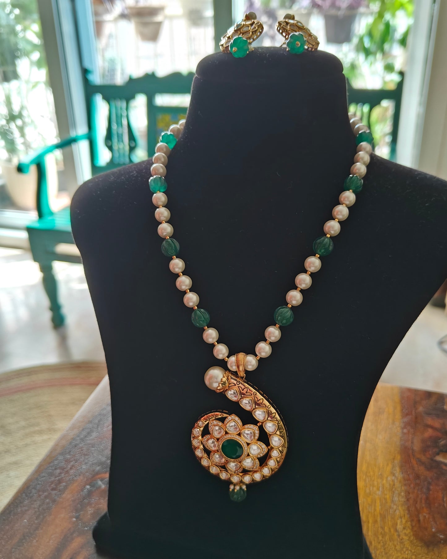 Jalela set with spiral kundan pendant on pearl and emerald stone ring