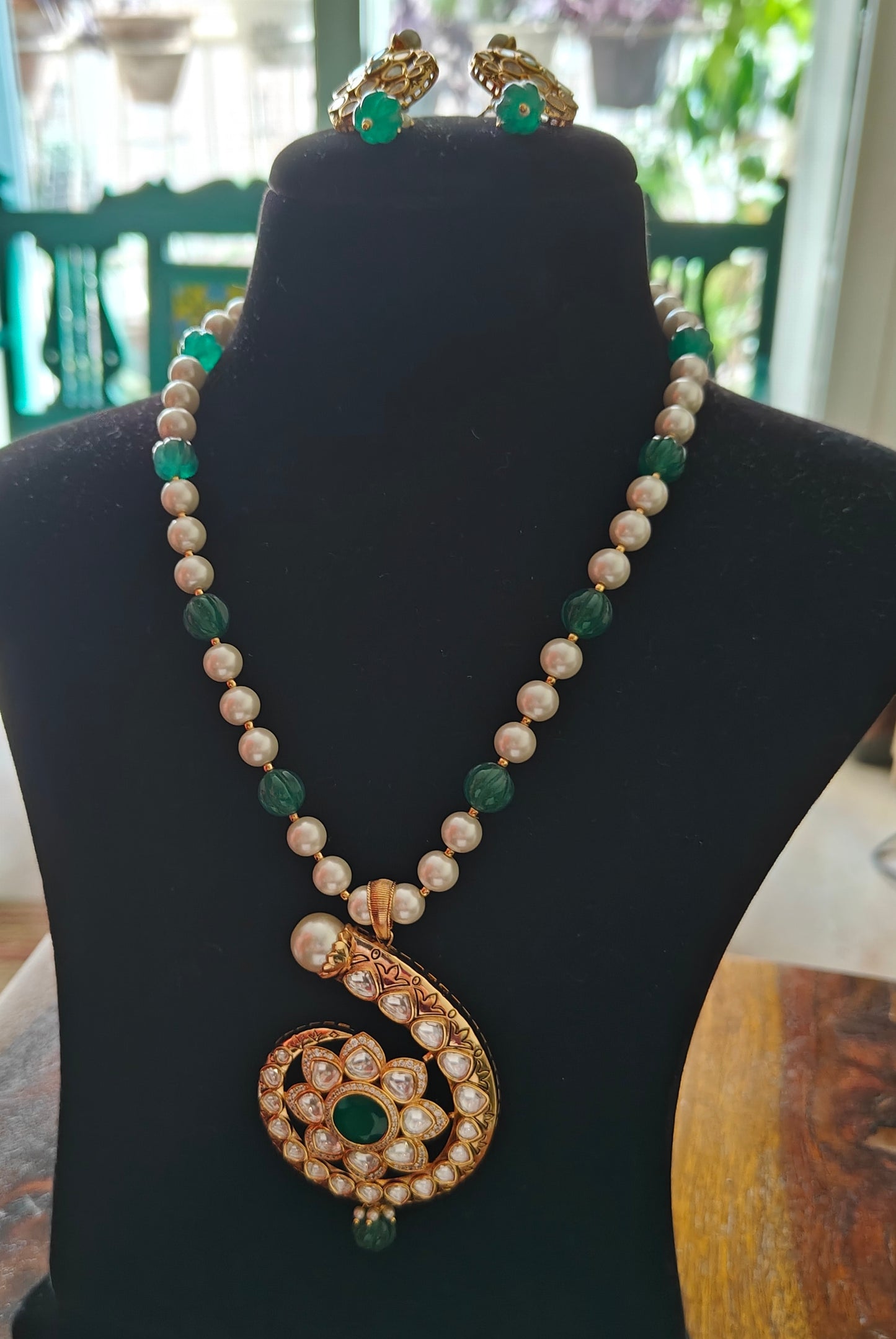 Jalela set with spiral kundan pendant on pearl and emerald stone ring