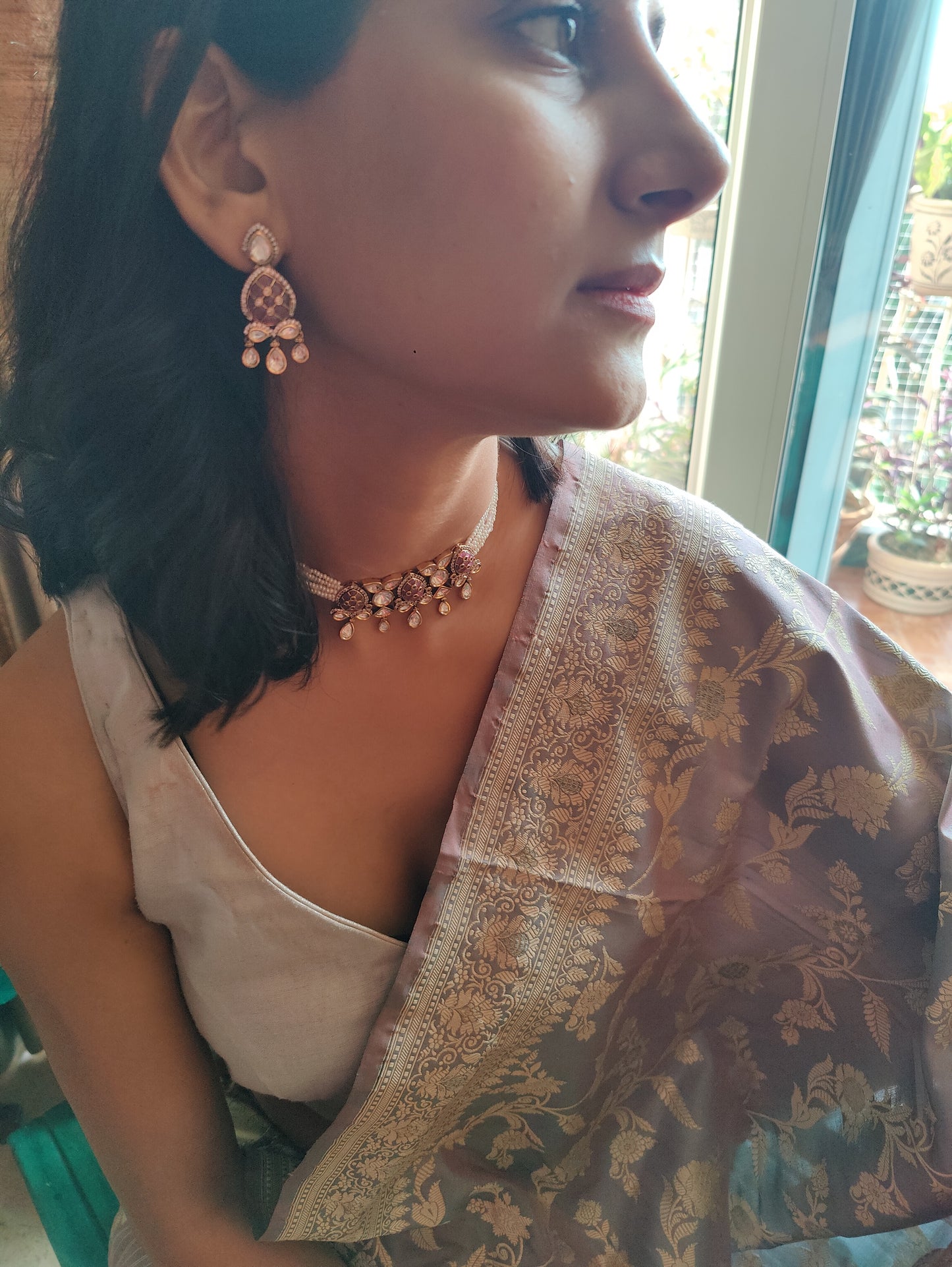 Jaiman choker set with pink stones and moissanite on poth pearl strings
