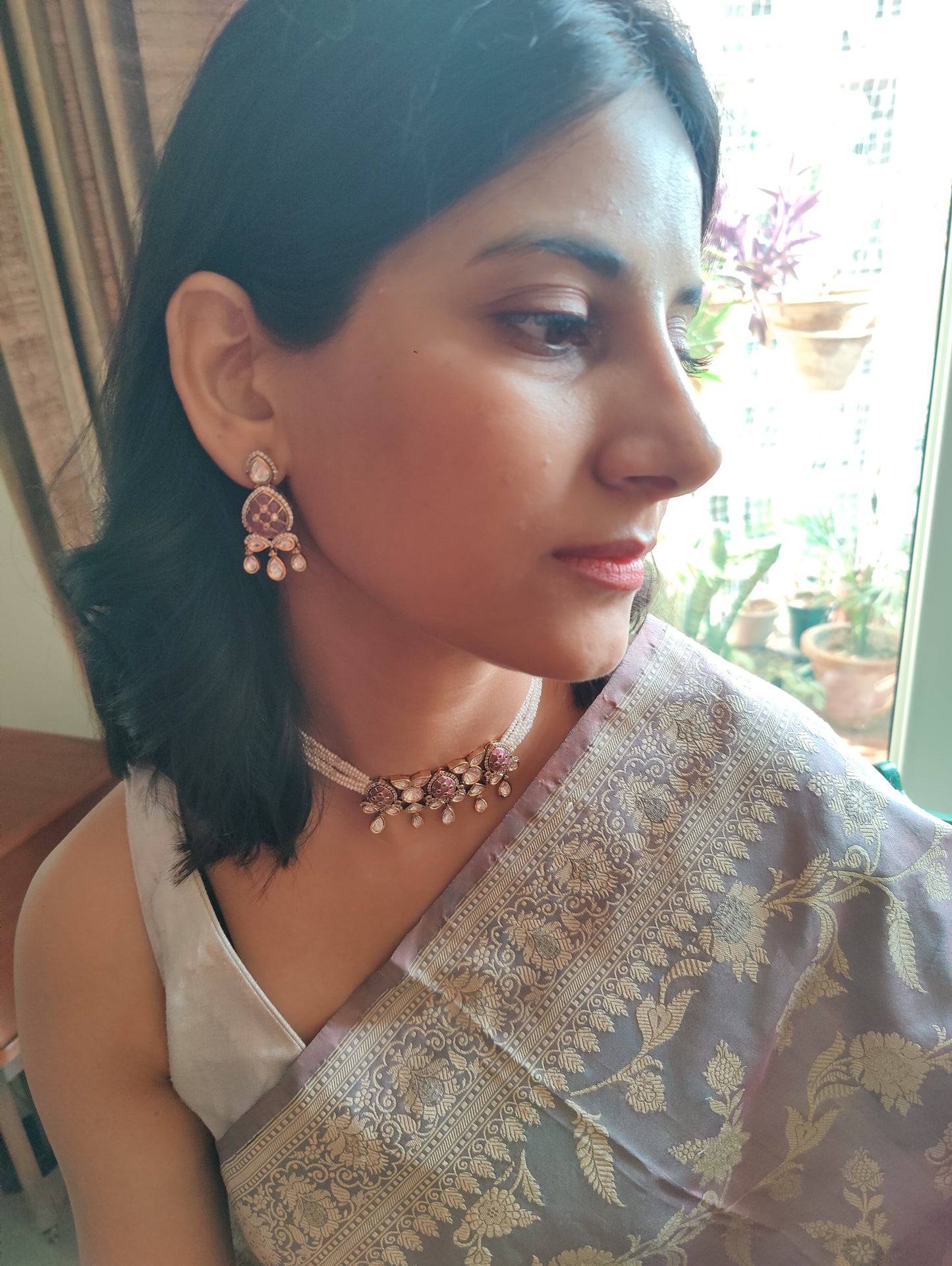 Jaiman choker set with pink stones and moissanite on poth pearl strings