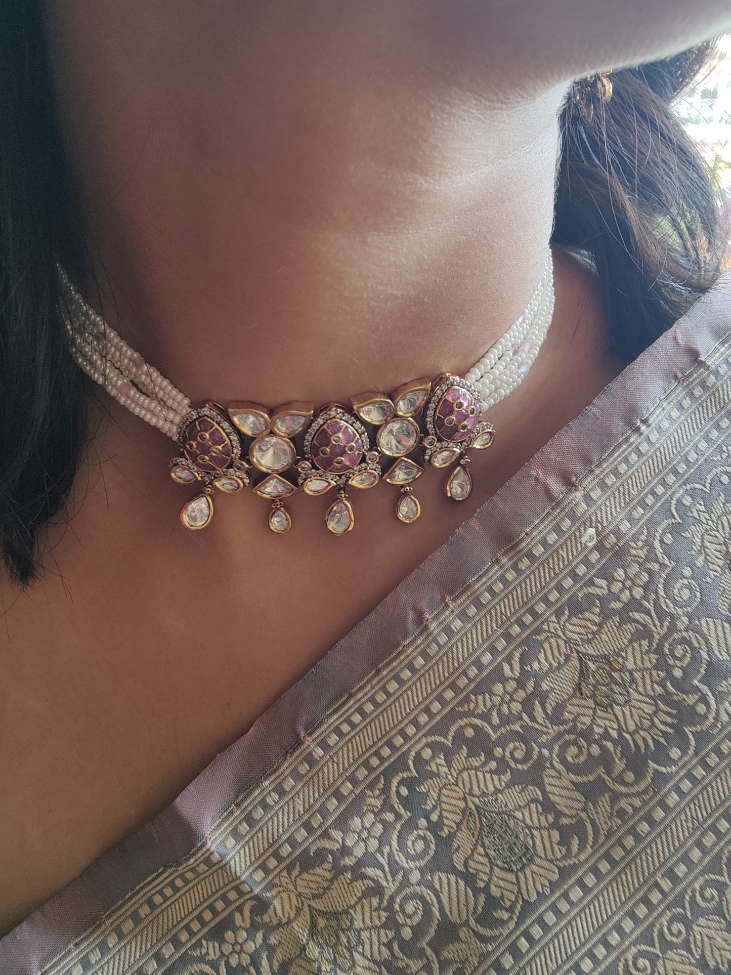 Jaiman choker set with pink stones and moissanite on poth pearl strings