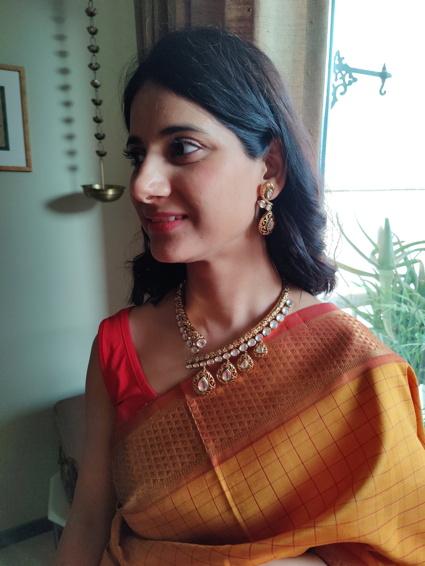 Khyati hasli set in antique finish with kundan