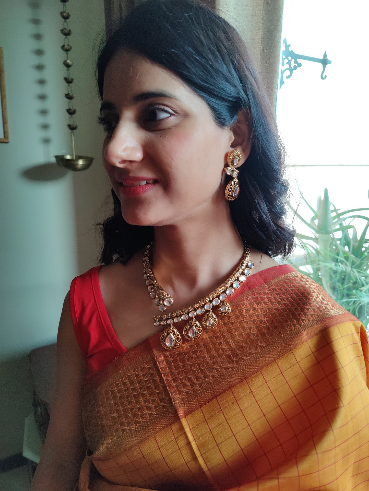 Khyati hasli set in antique finish with kundan