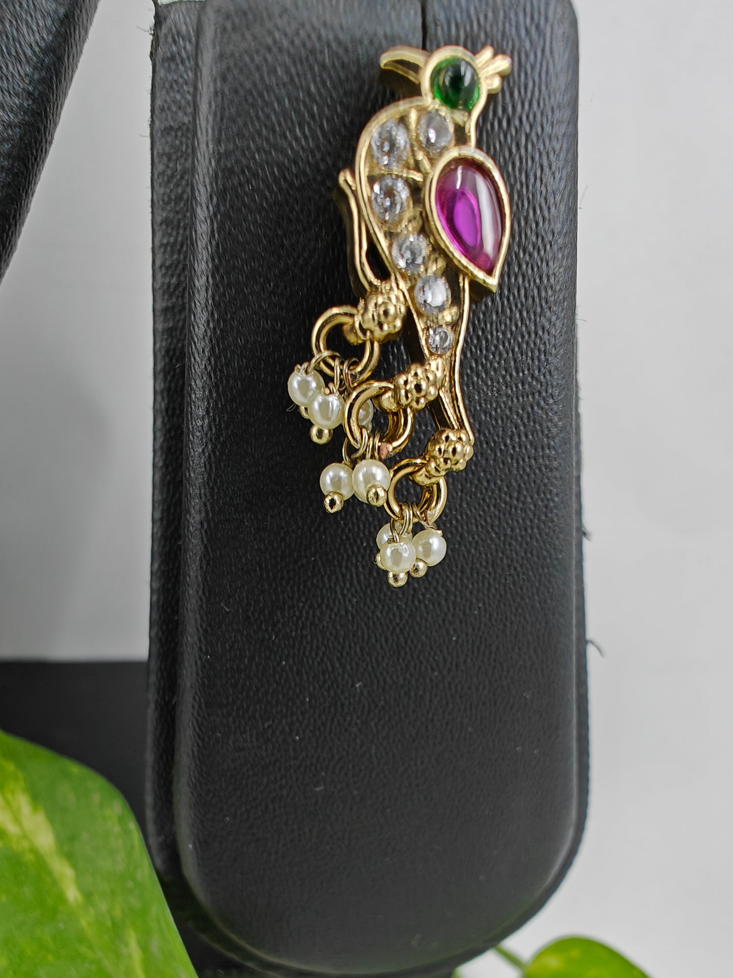 'Parindey' set with stone studded birds perched on a woven flat chain necklace