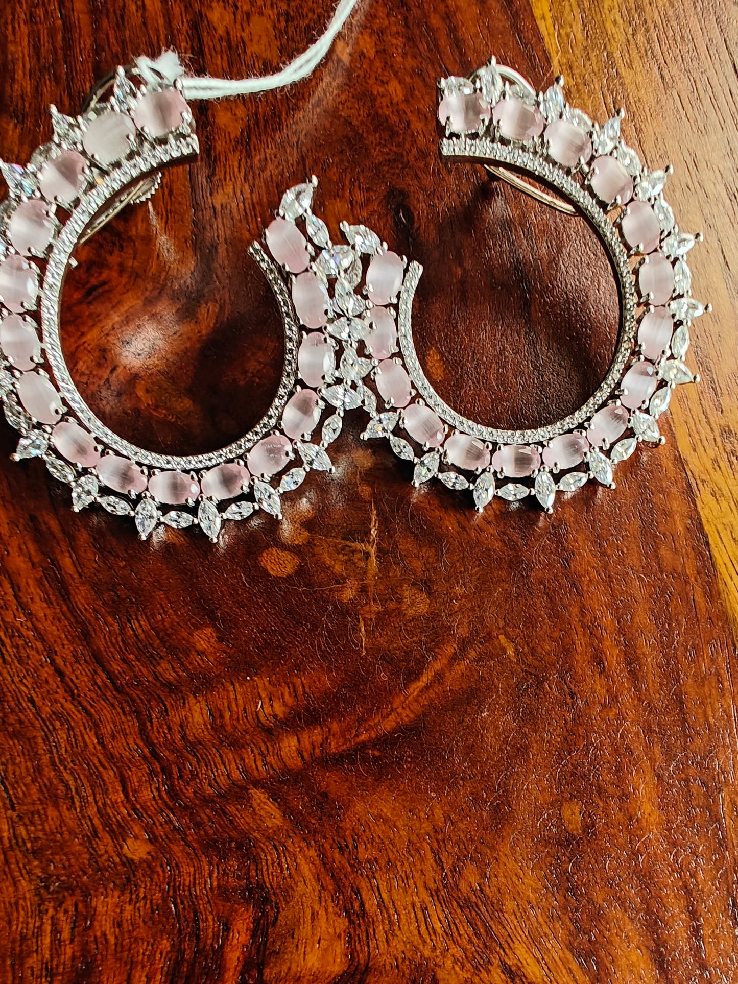 Platinum finished big earrings with baby pink inlay highlighted with CZ
