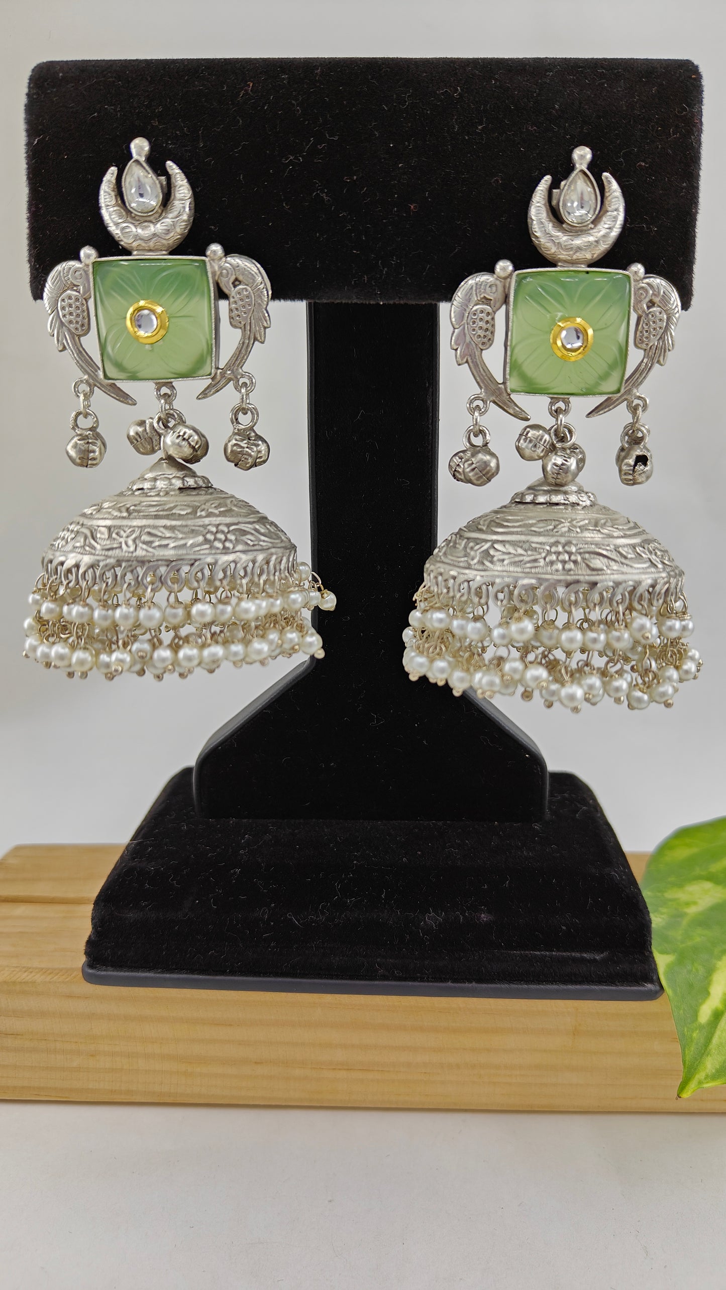 Nazin jhumkas with mint green stone and kundan