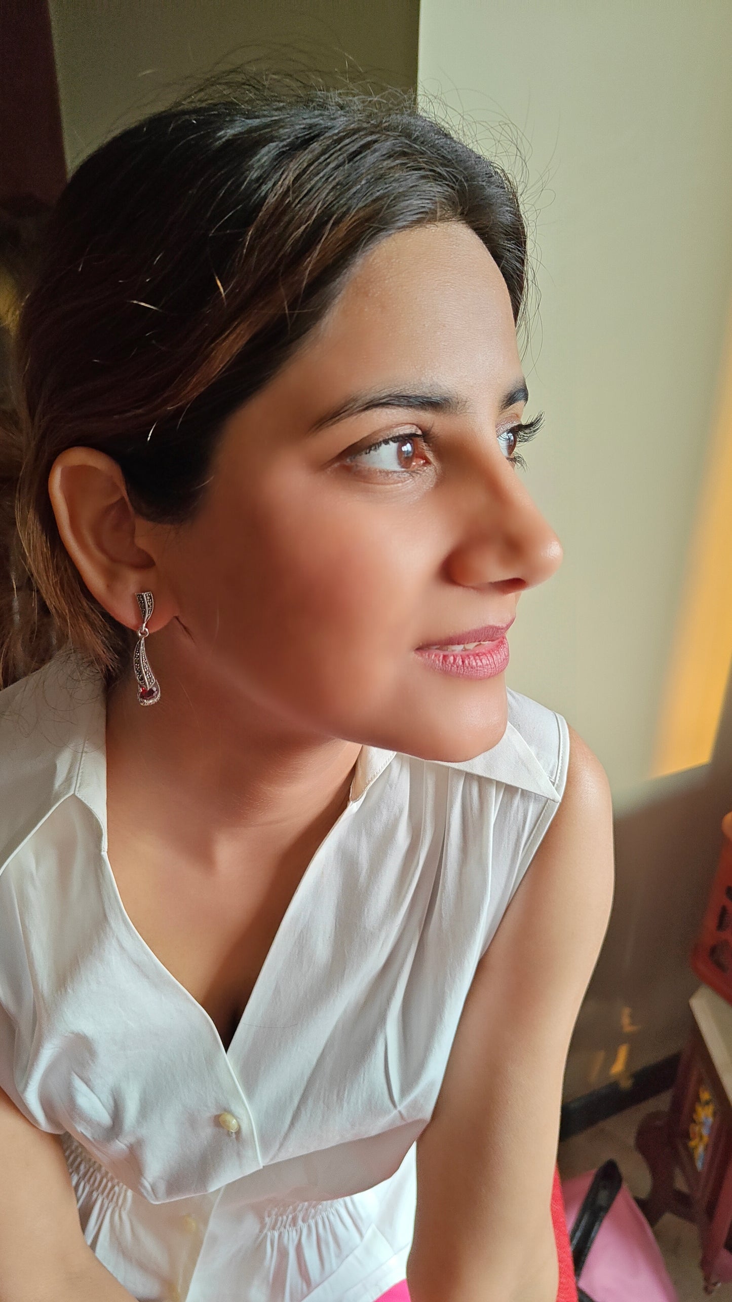Matsya elegant silver earrings with ruby red stone