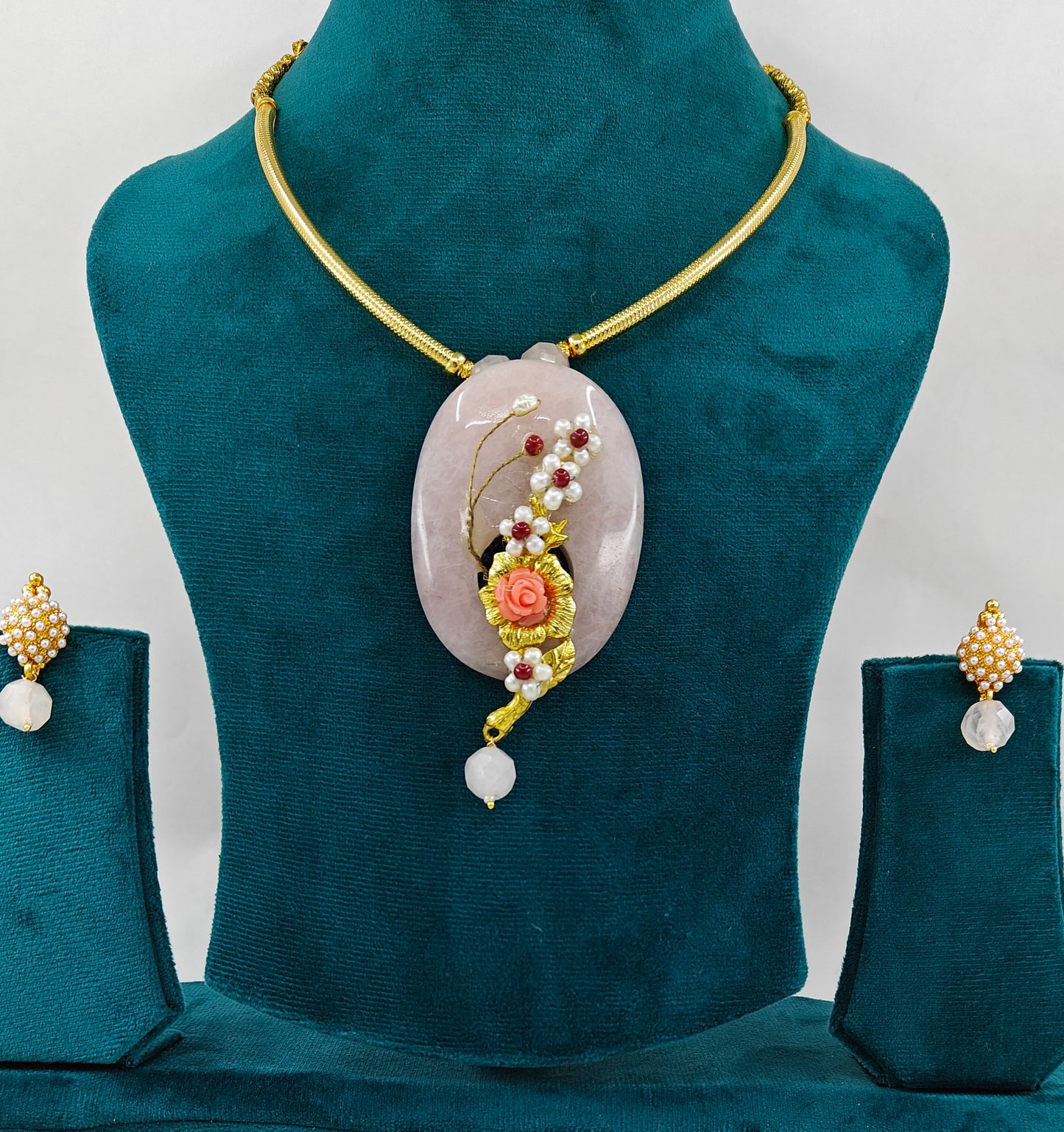 Set with baby pink stone with work on golden pipe hastli