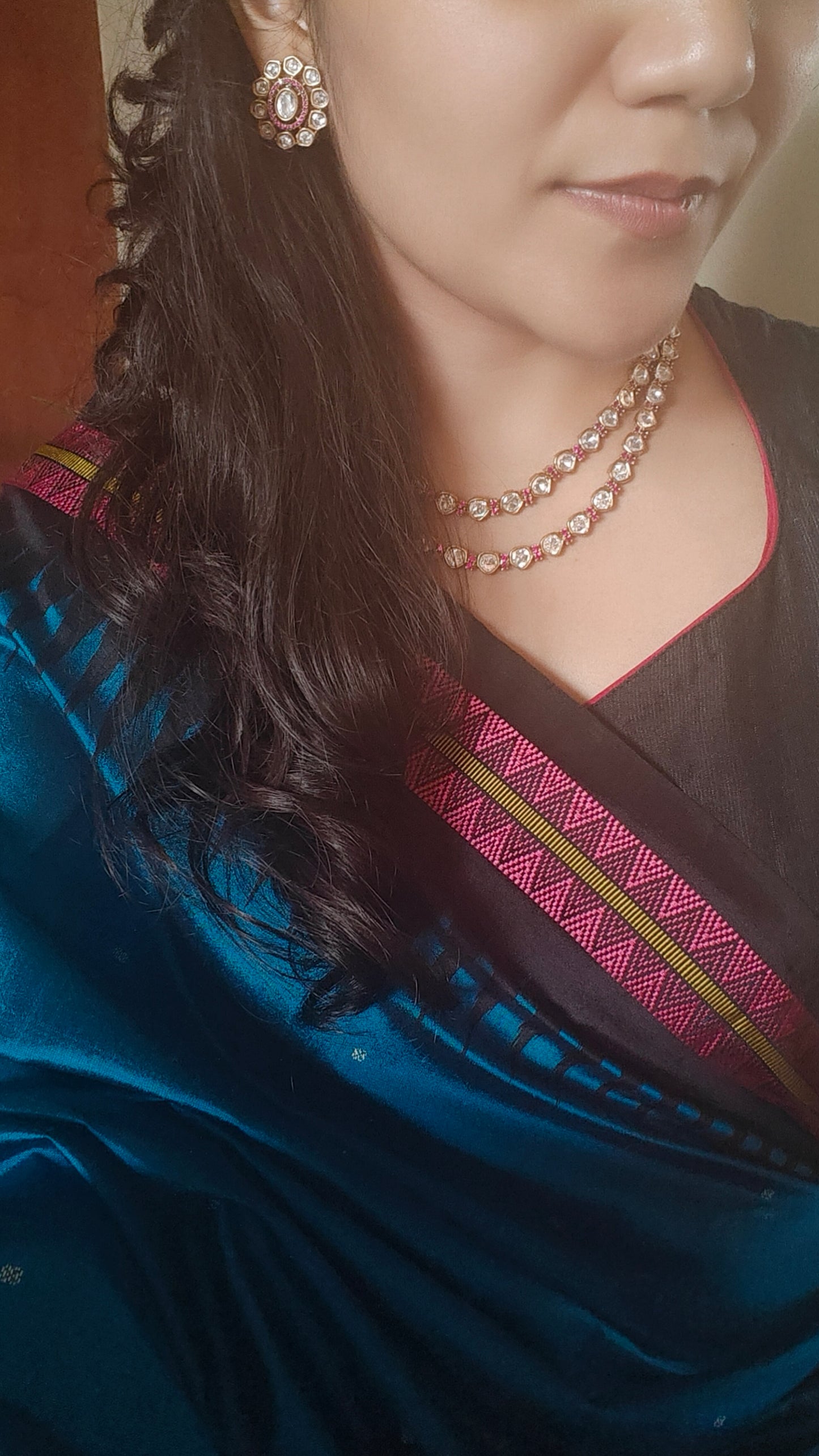 Anika set in Kundan and ruby/emerald stones