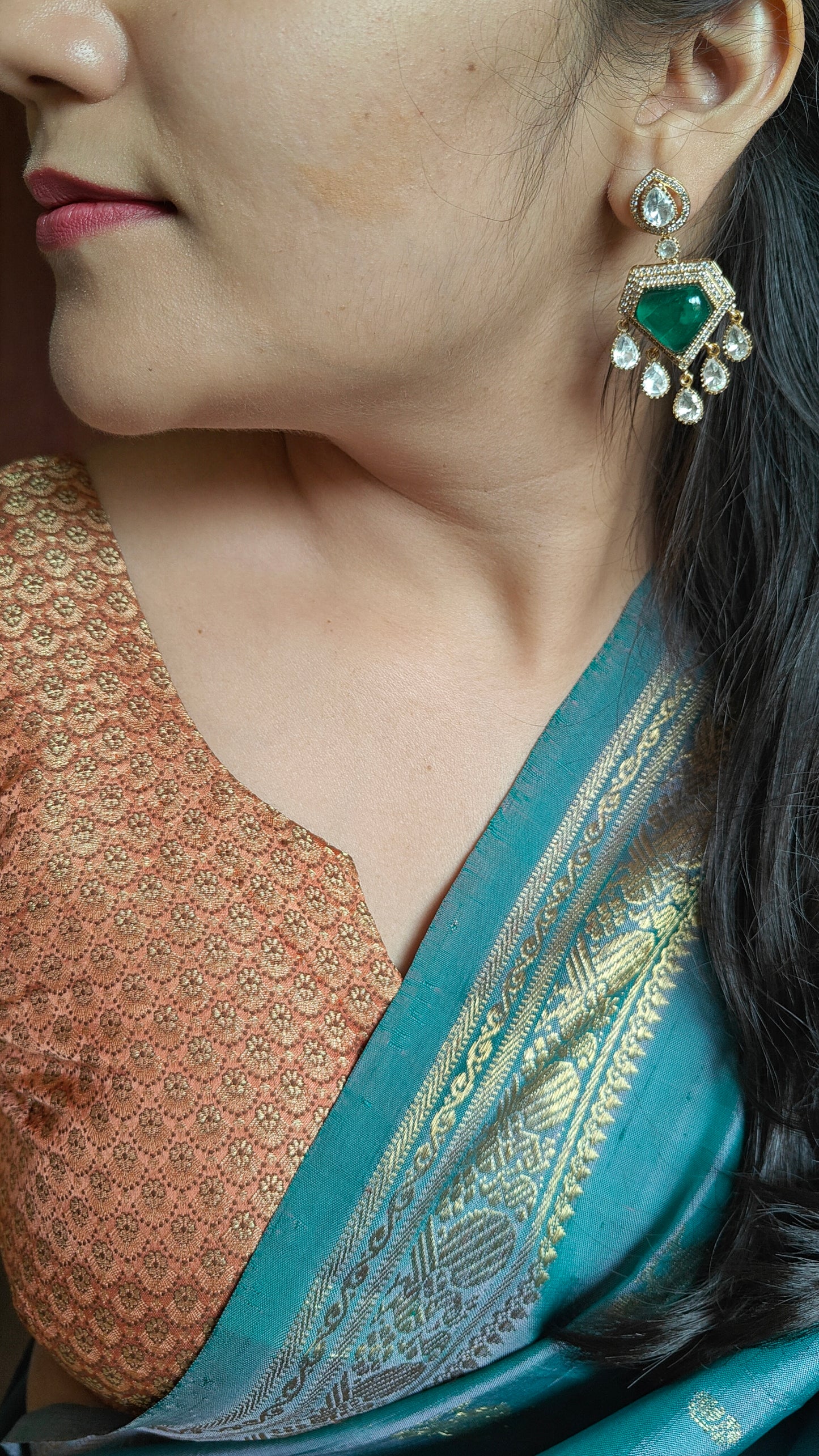 Nitya earrings with emerald green stone and moissanite