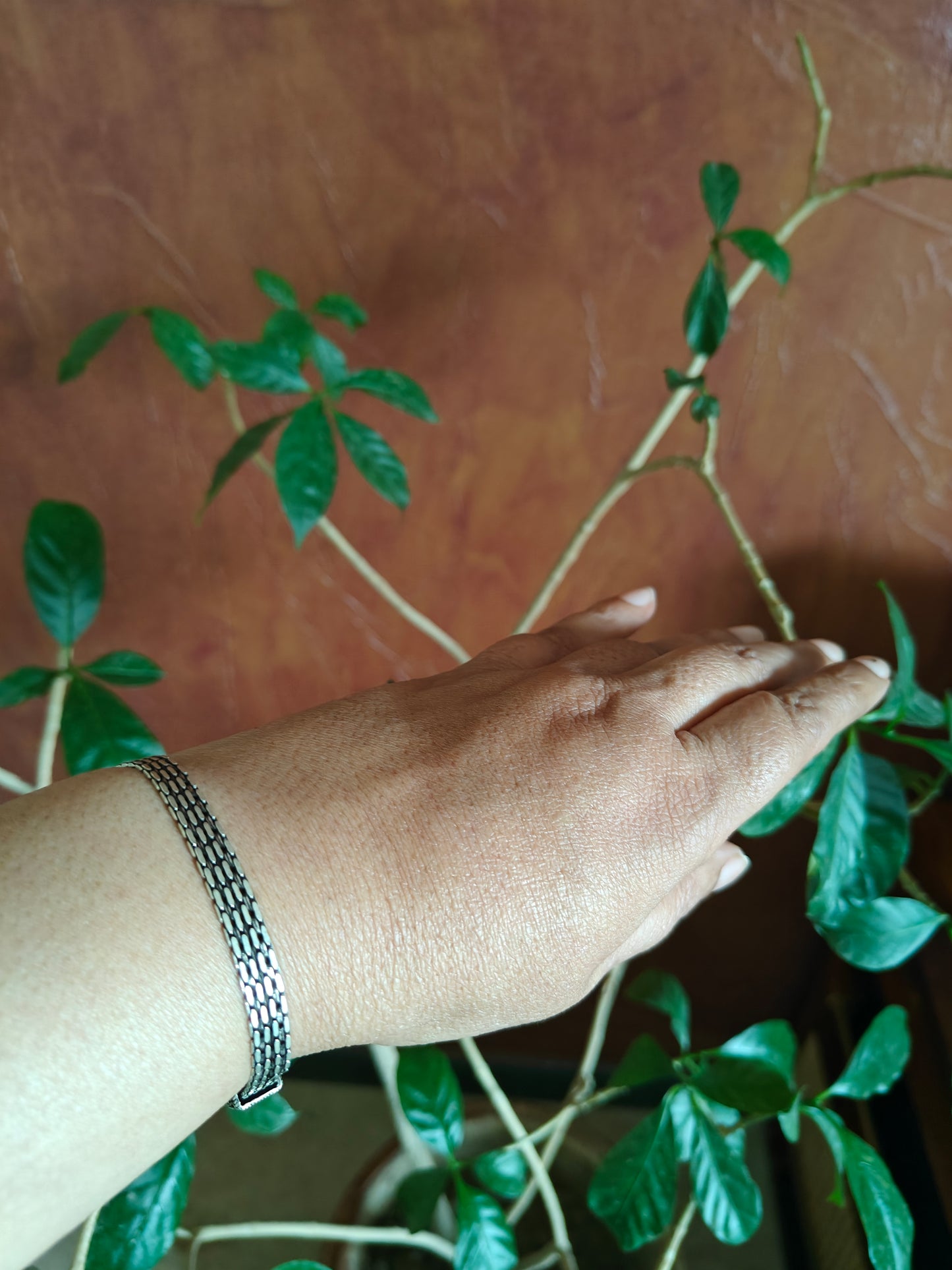 Faria silver bracelet with strap design