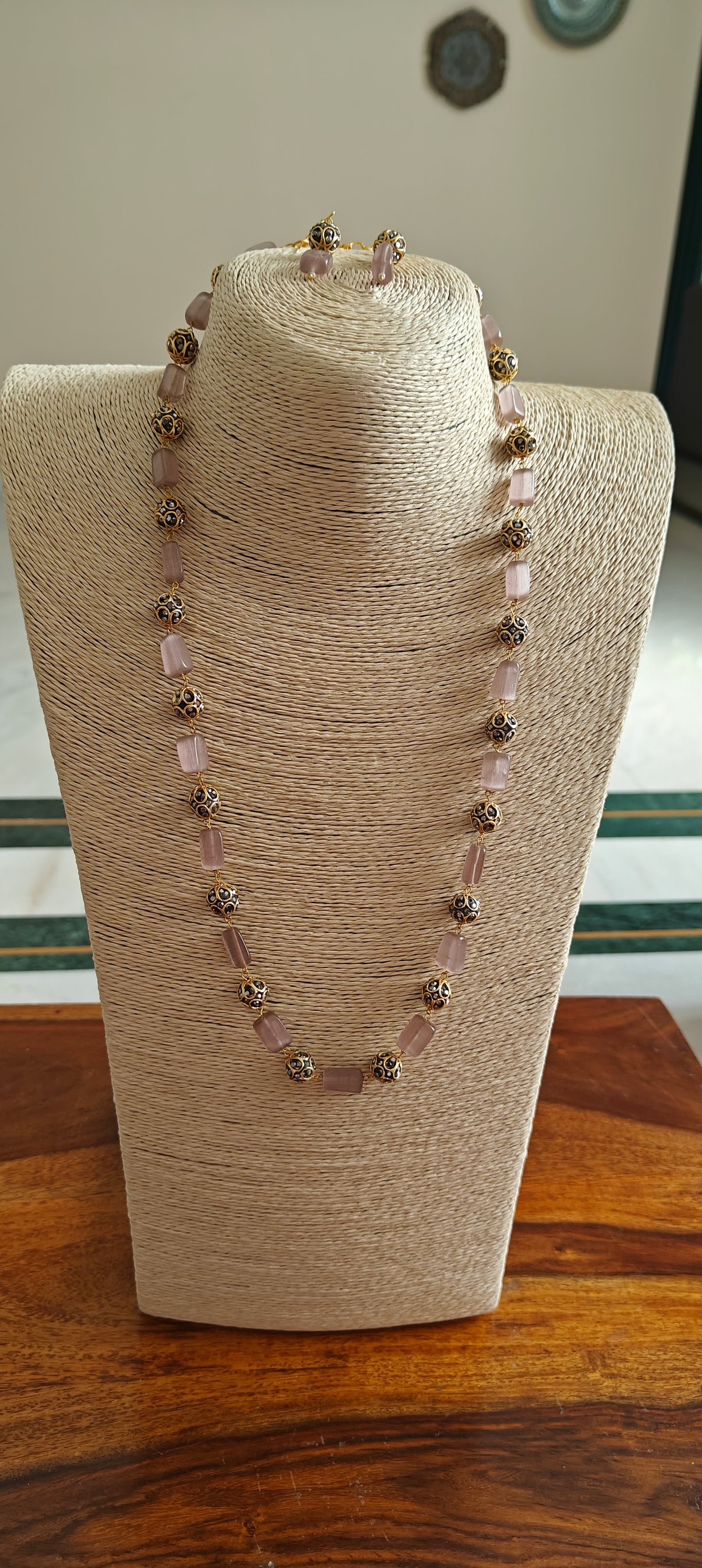 Bead set with rectangular stones and metal beads