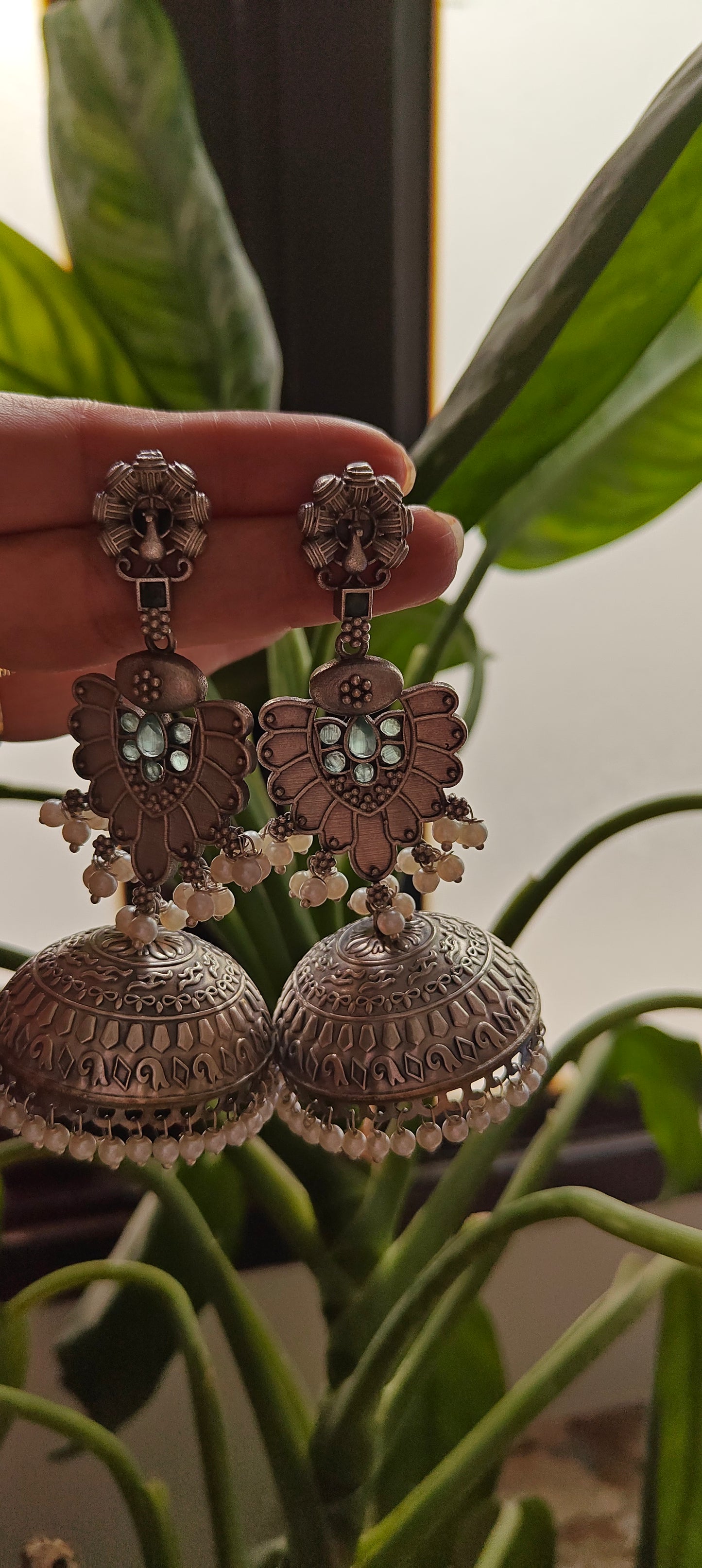 Big Jhumkis with peacock studs and blue stones,pearls