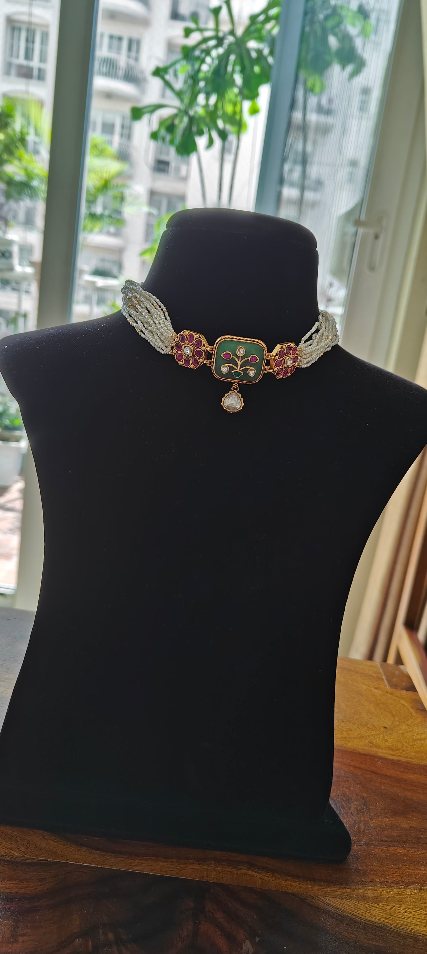 Dyanita choker set on poth pearl strings with mint green stones with work