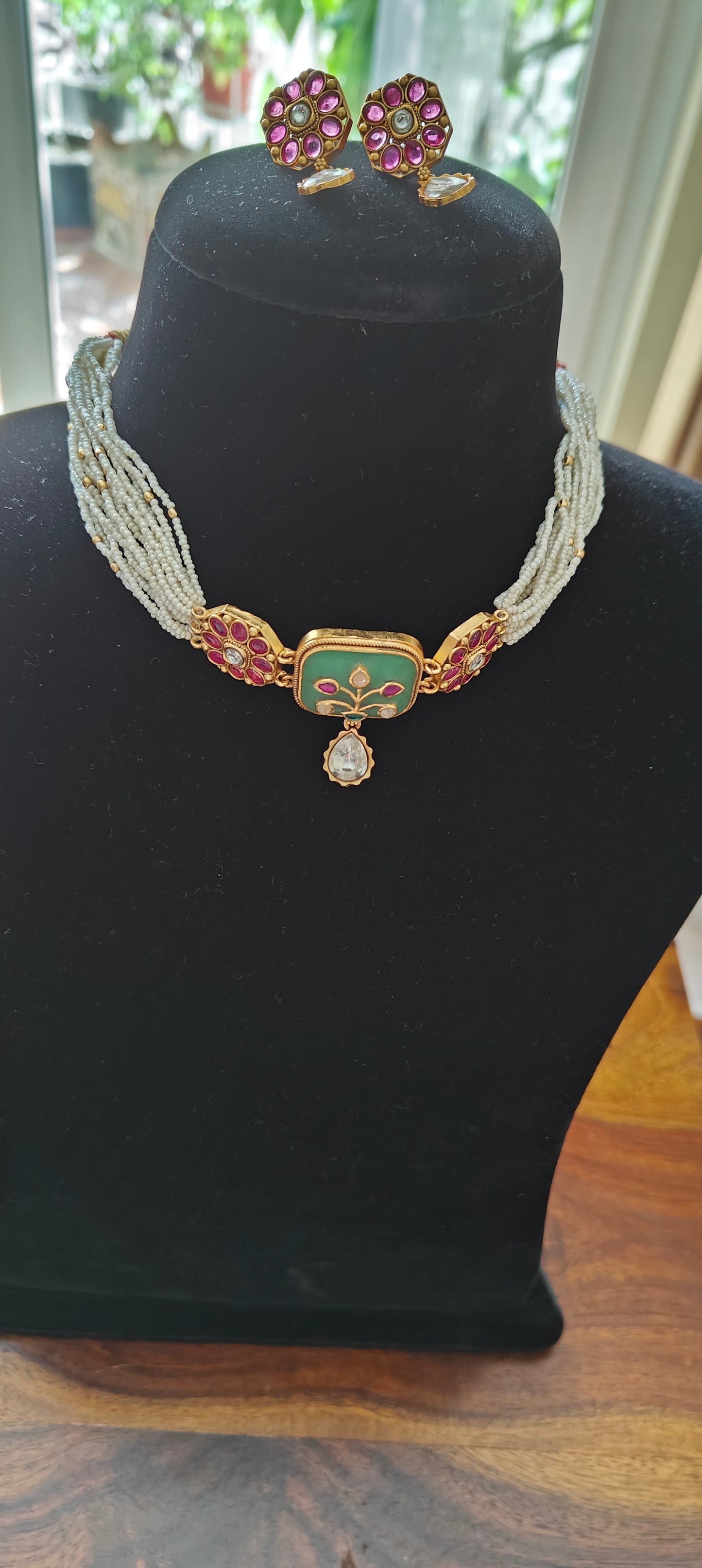 Dyanita choker set on poth pearl strings with mint green stones with work