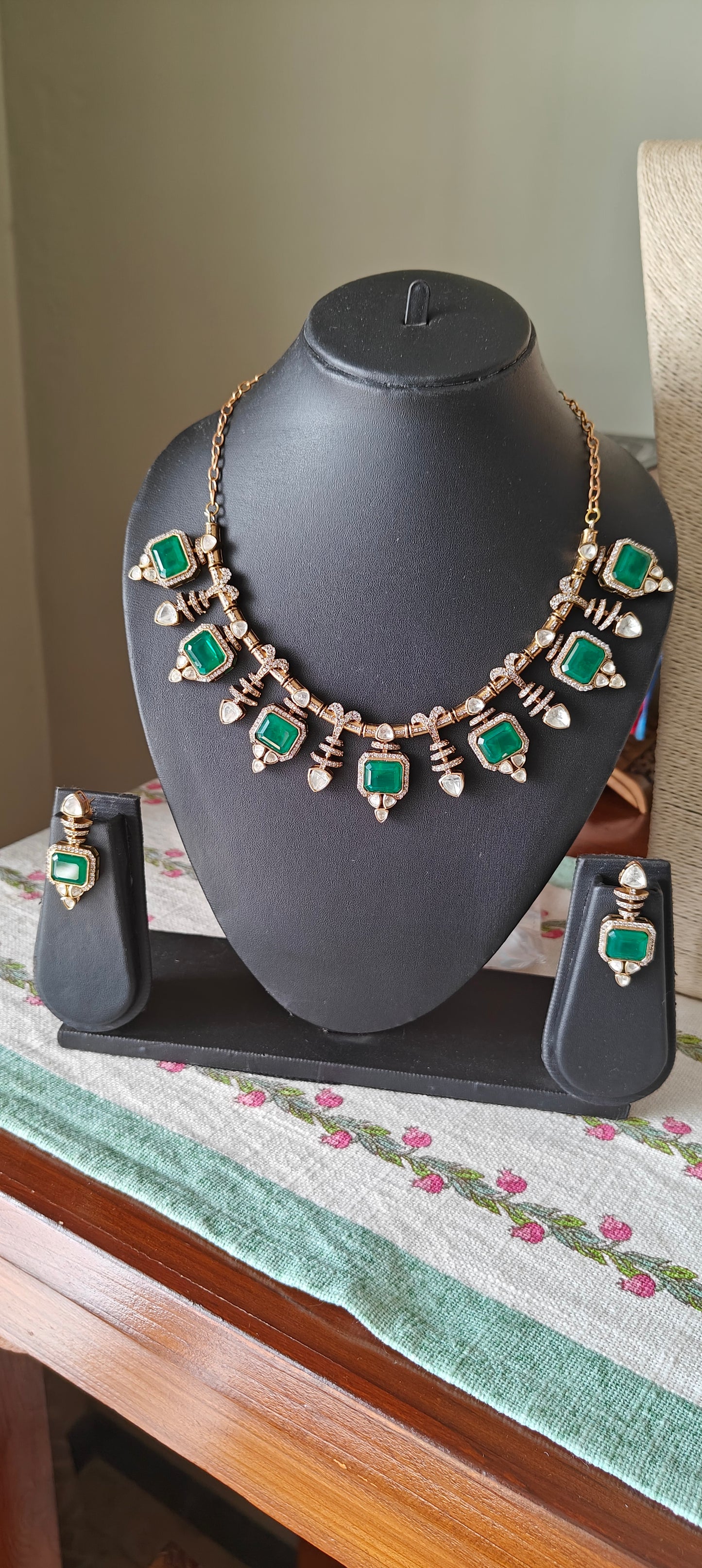 Bhavya necklace set with emerald stone and moissanite
