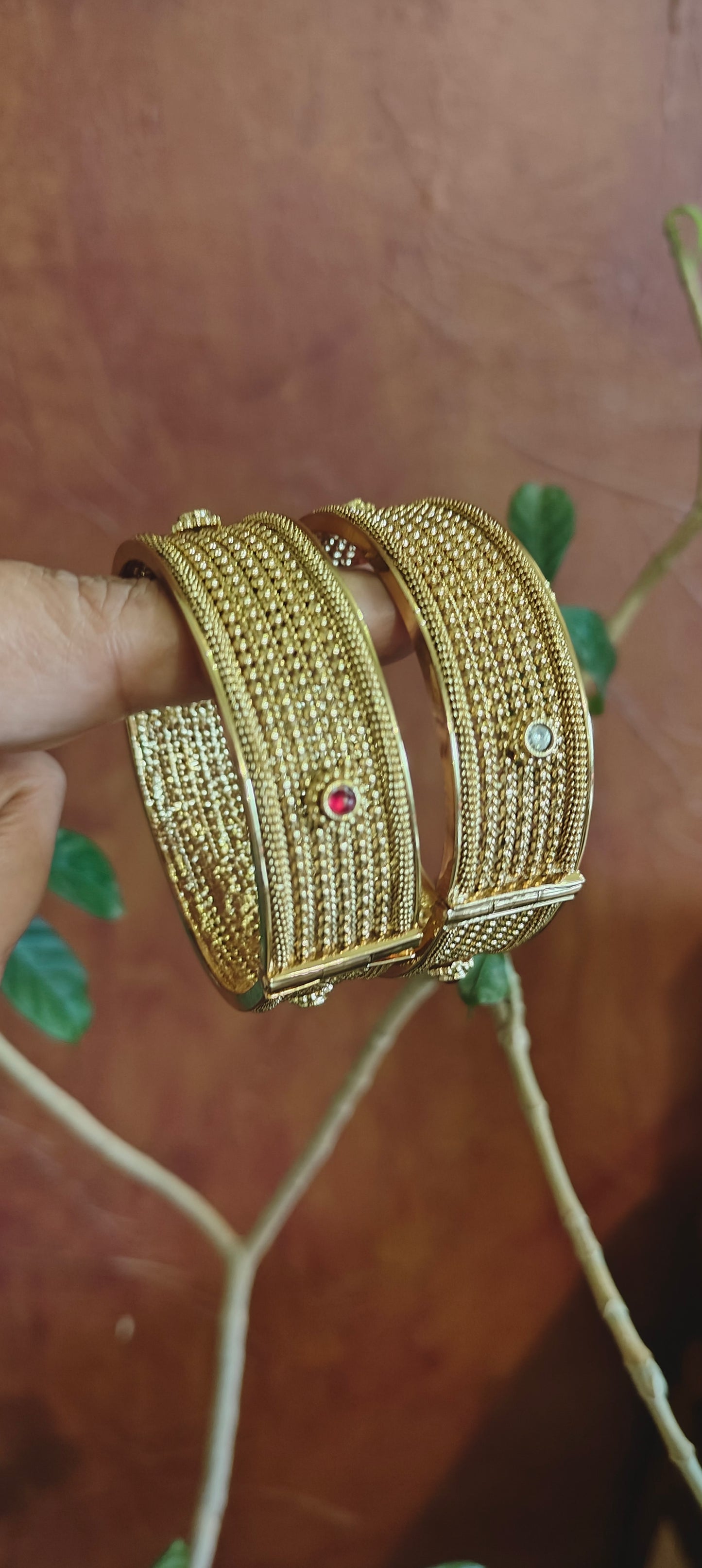 Golden karas with red and white stones(2pc)