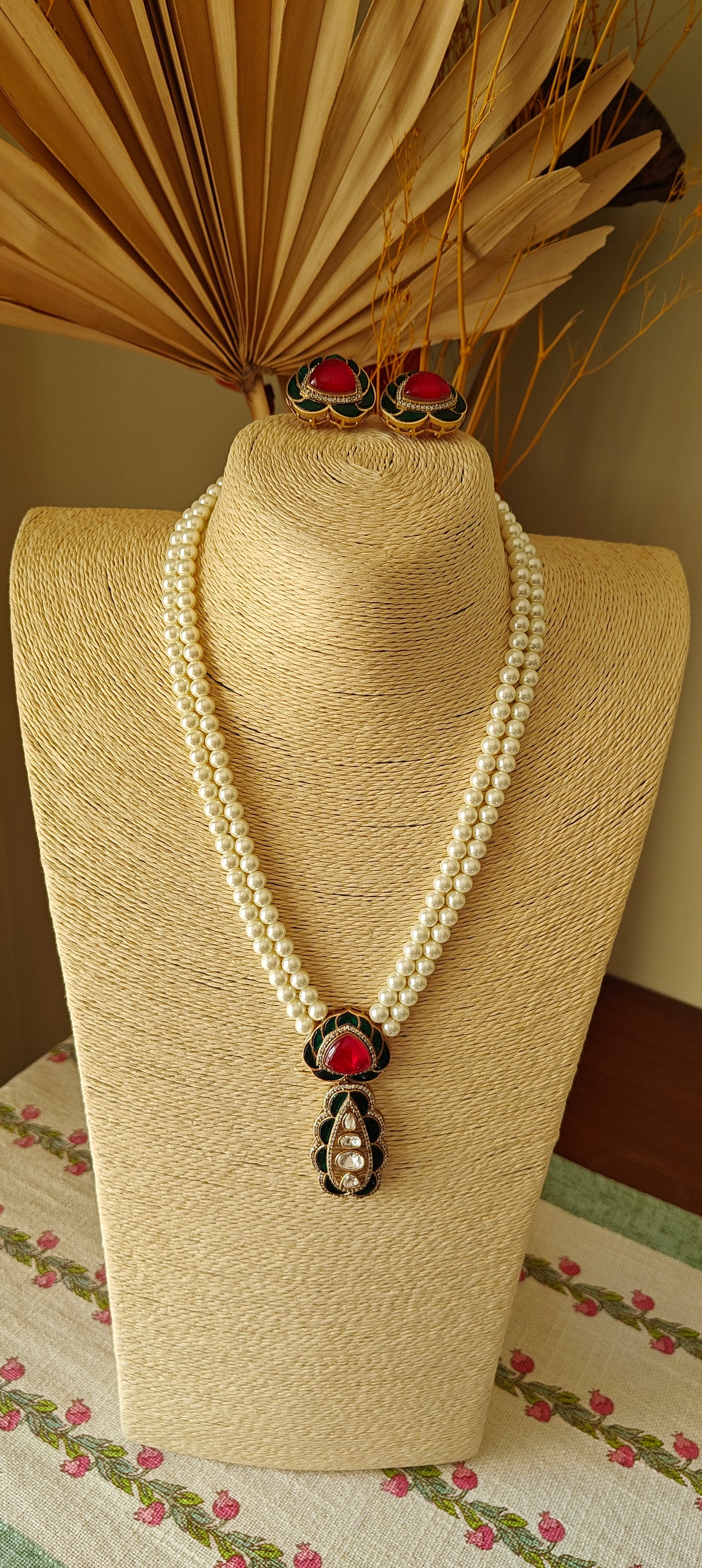 Bhanuja pearl strings set with kundan and stone