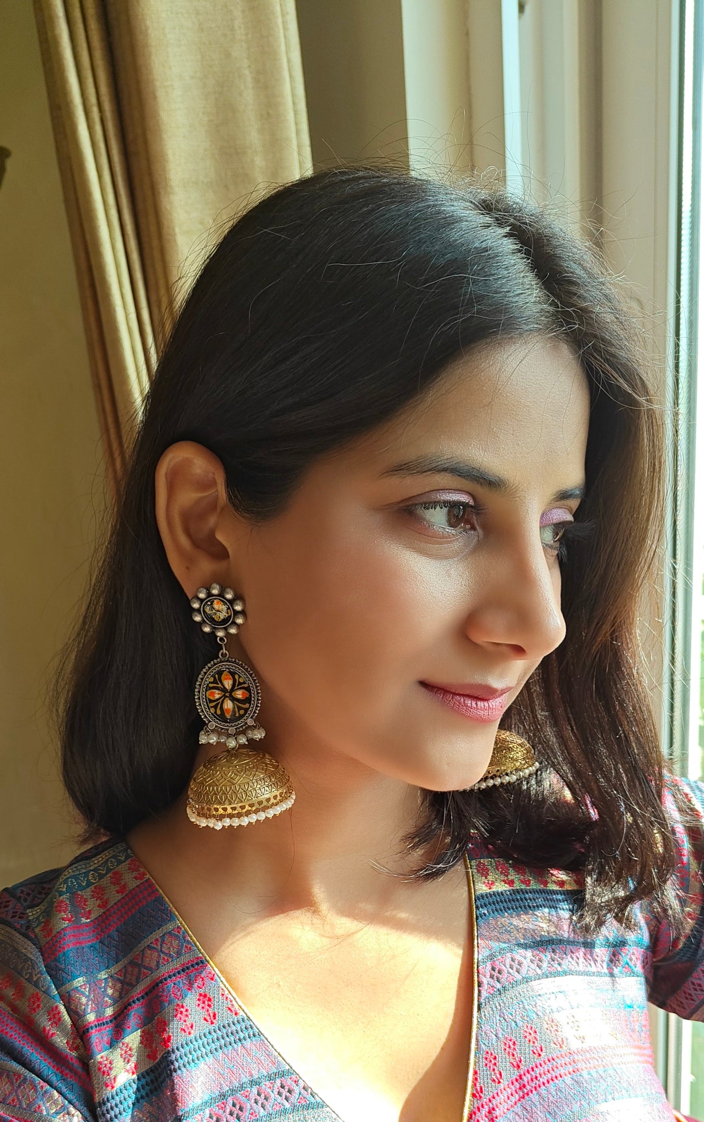 Jiya double tone jhumkas with painted flowers