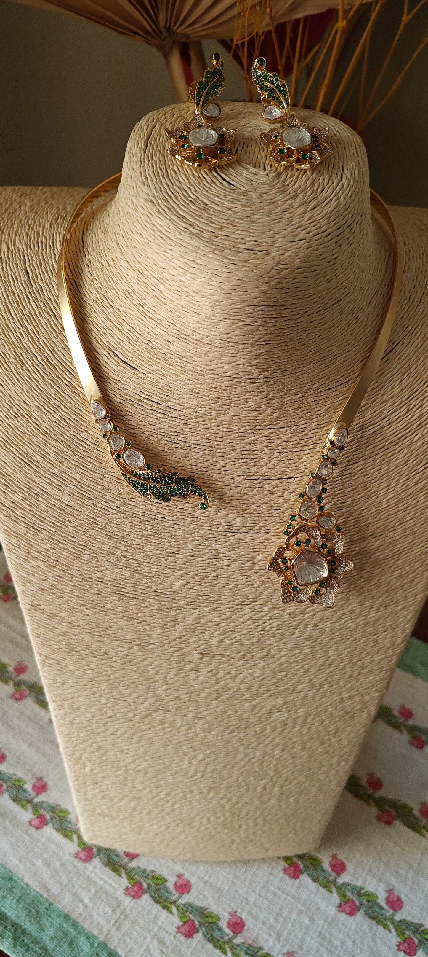 Hemlata gold hasli with kundan and coloured stones