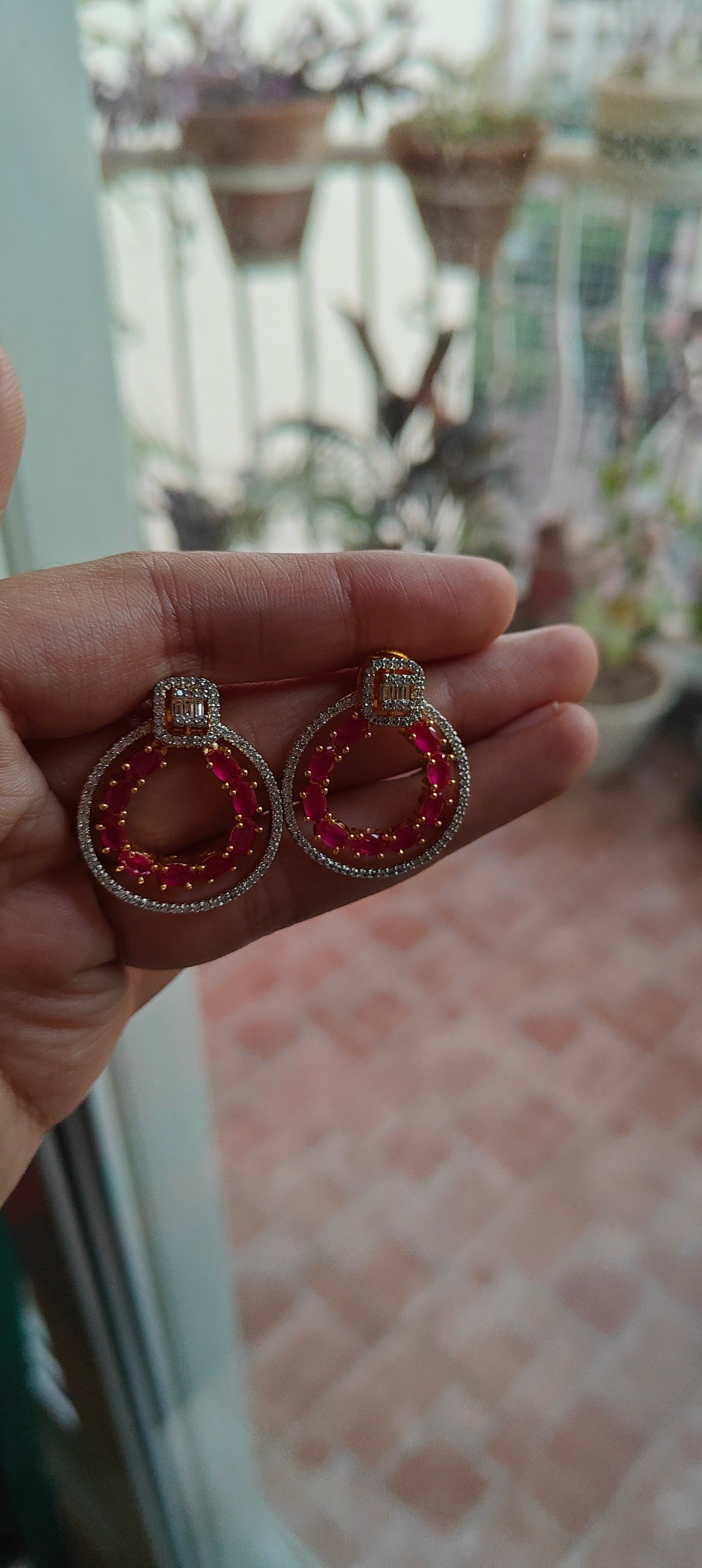 Ruby red/ emerald green circular earrings with Cz highlights