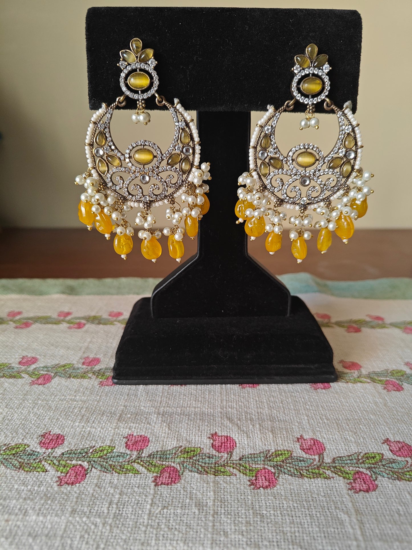 Moon style earrings with coloured stone hangings