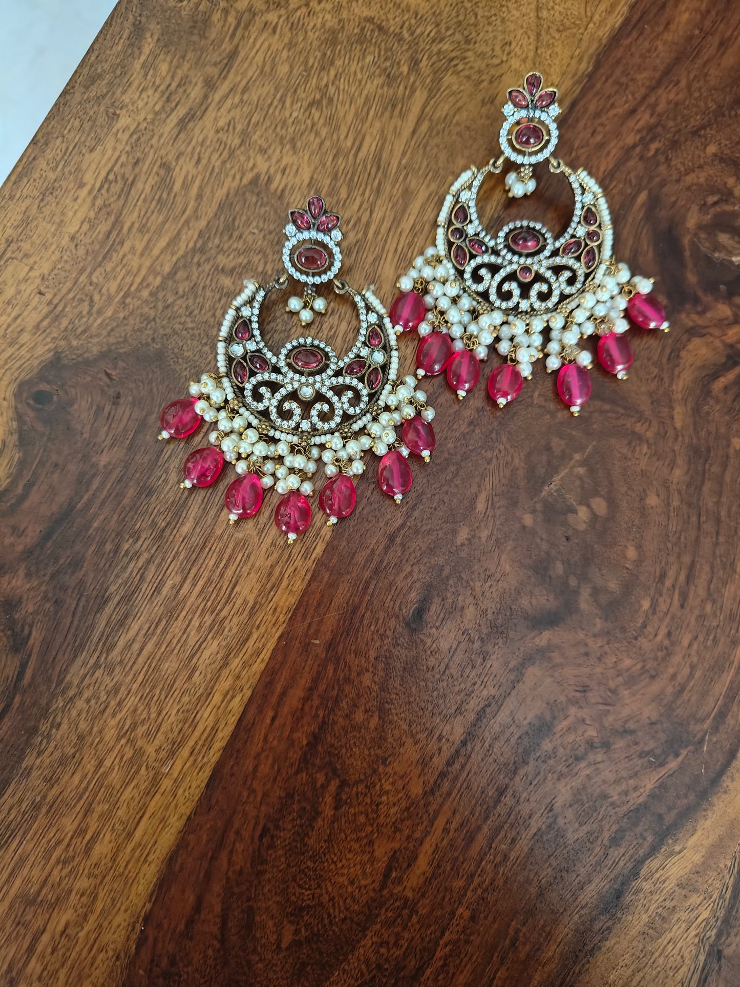Moon style earrings with coloured stone hangings