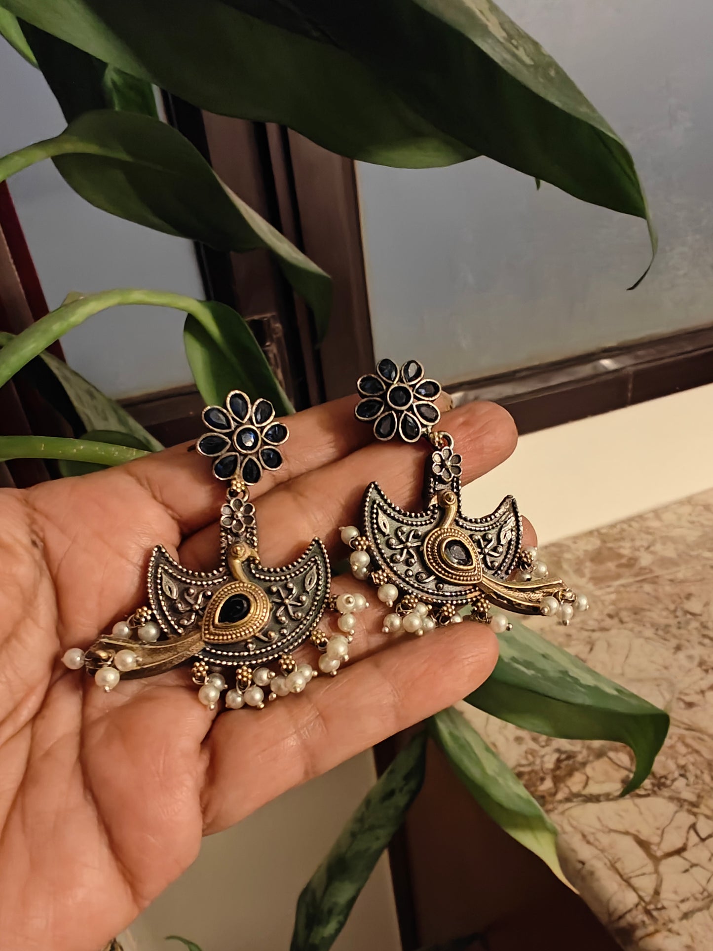 Dual tone peacock earrings with stones and pearls